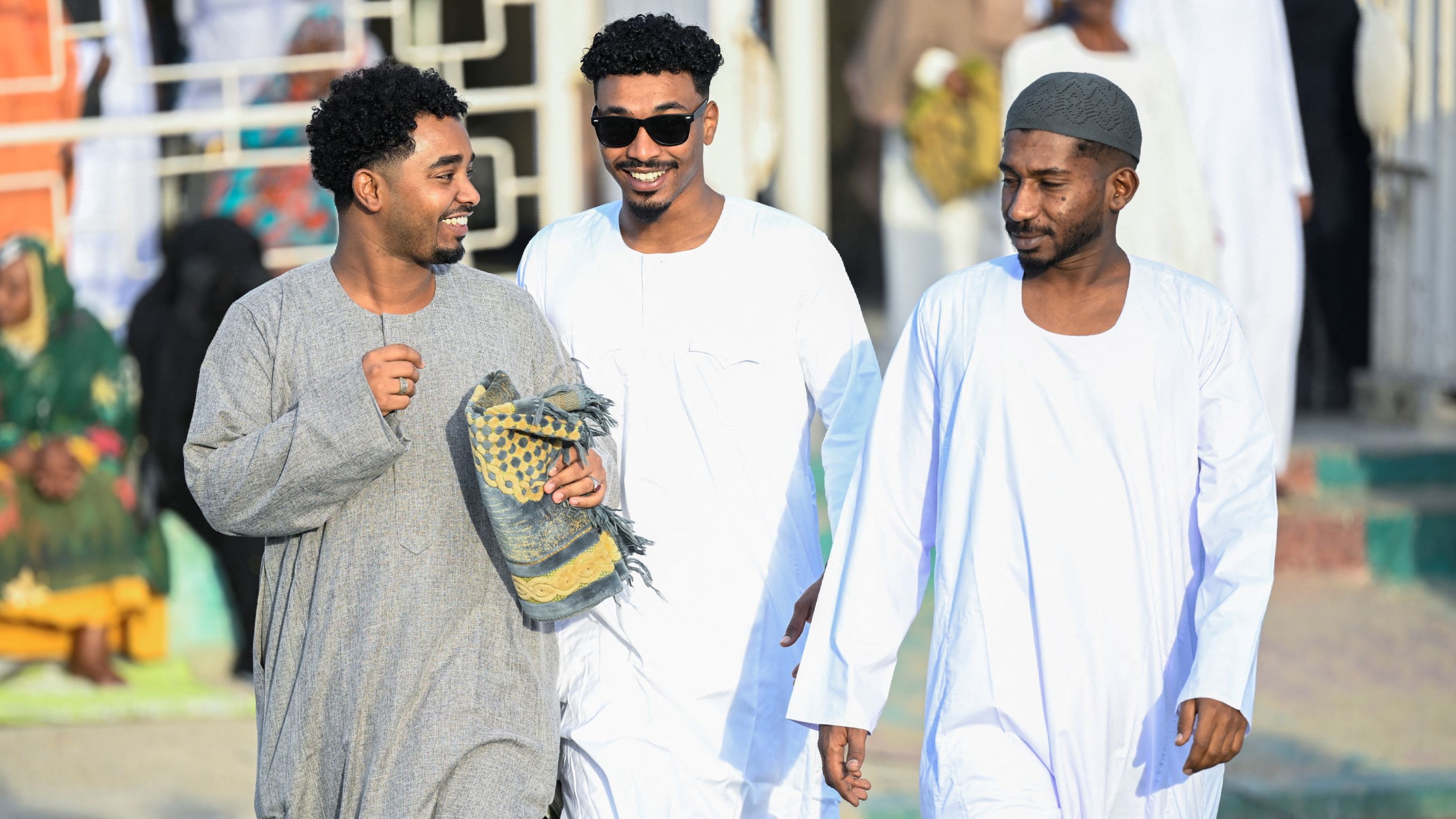 Muslim worshippers attend Eid al-Fitr prayer, marking the end of the holy month of Ramadan at a stadium in Port Sudan, Sudan.
