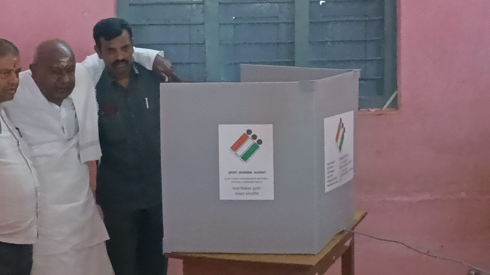JD(S) supremo H D Deve Gowda at the polling booth to cast his vote in Hassan.