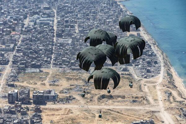 UK Armed Forces airdrop food supplies to civilians in Gaza.