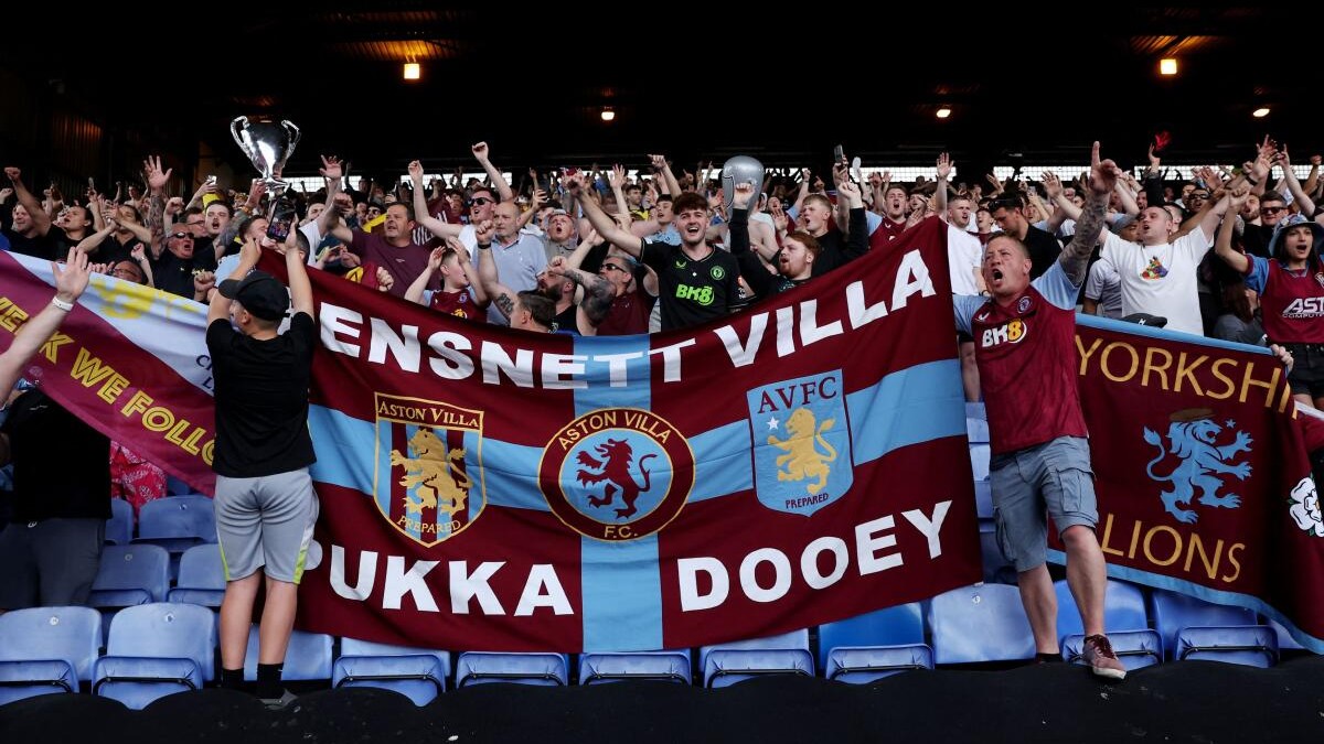 Aston Villa fans celebrate qualifying for the Champions League.