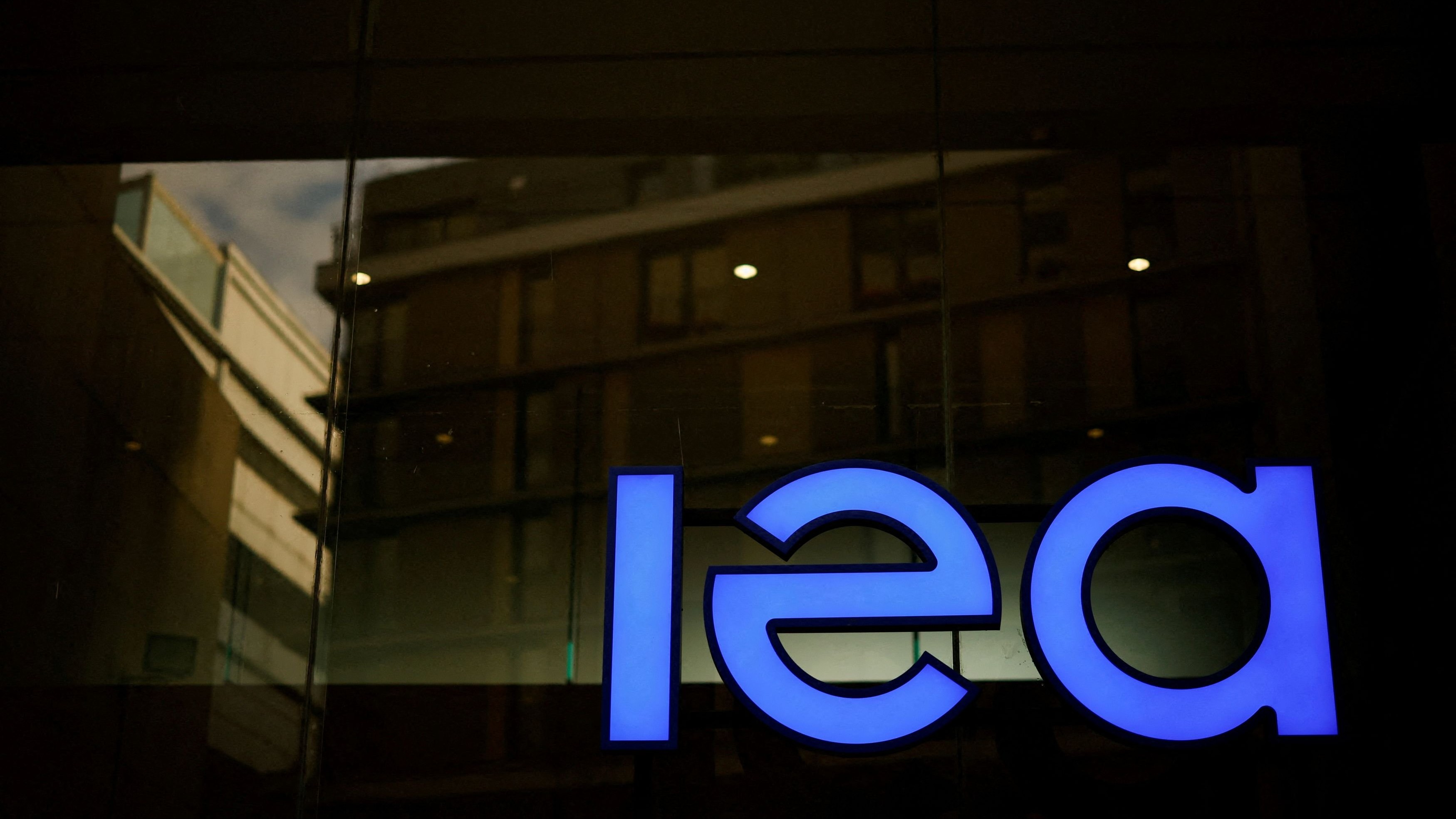 IEA trims 2024 oil demand growth forecast, widening gap with OPEC view