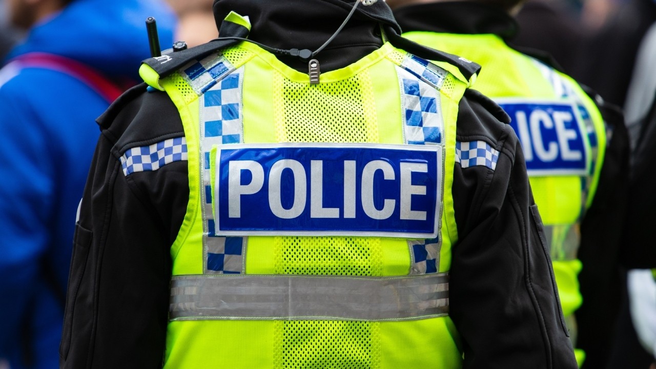 UK police charge three men with helping Hong Kong's foreign intelligence service 