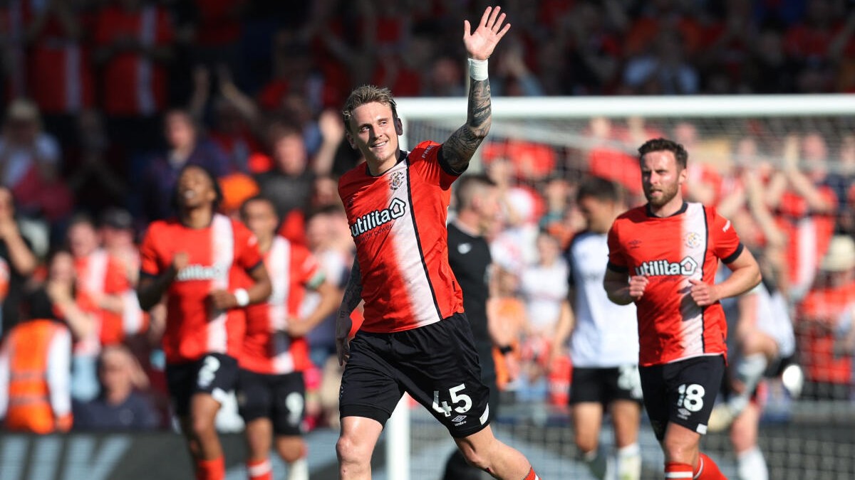 Luton Town's Alfie Doughty celebrates scoring a goal.
