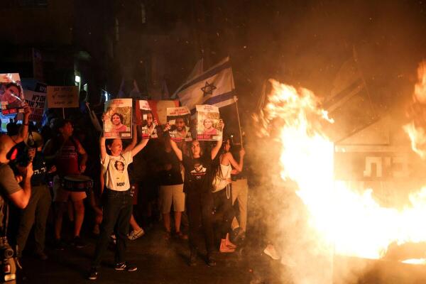 People protest on a day of strike and resistance, amid the Israel-Hamas conflict, outside Israeli Prime Minister Benjamin Netanyahu's residence in Jerusalem, June 27, 2024.