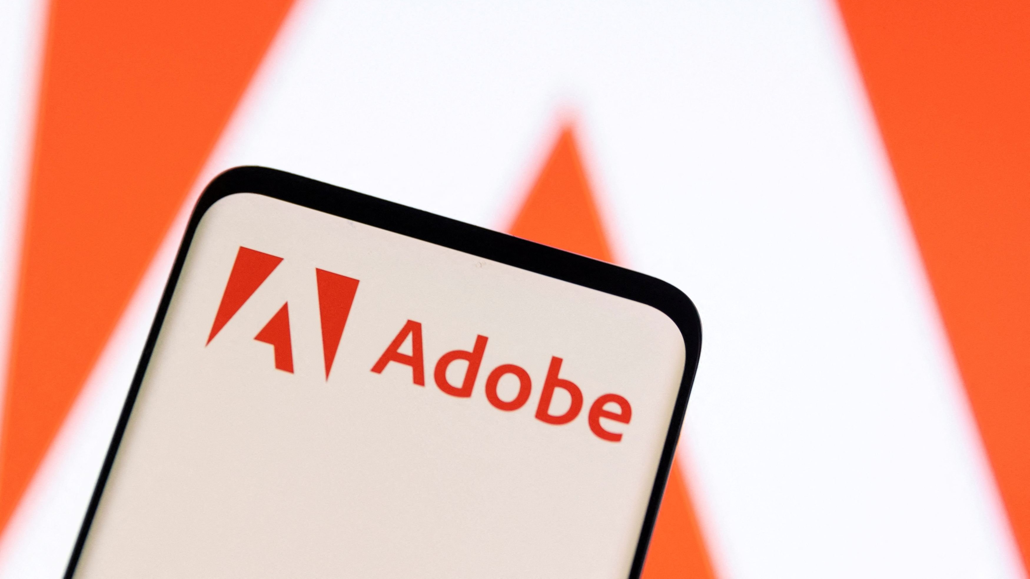 Adobe surges as AI optimism fuels annual revenue forecast