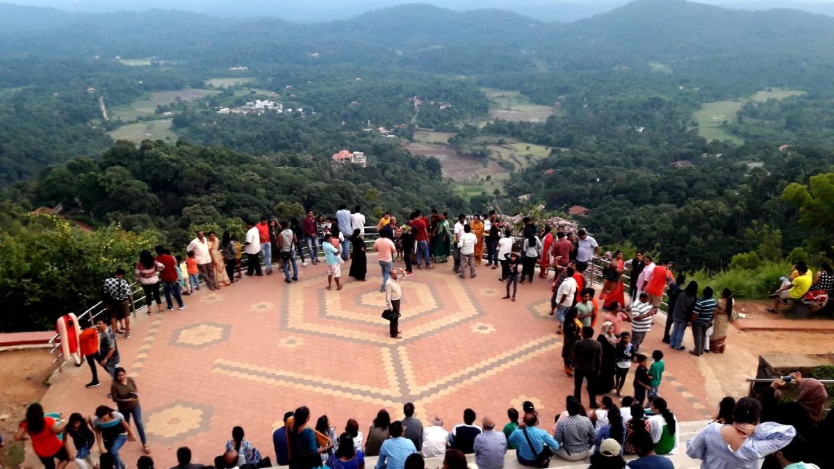 Madikeri, often called the "Scotland of India,"  is situated in the heart of Coorg, a perfect location for those seeking a peaceful escape amidst nature. The hill station is covered with tea and coffee plantations, and the rain makes these hills shine with a lush green glow that is awe-inspiring. The Scotland of India remains a tourist favourite for its stunning weather, magnificent views, and charming locals.