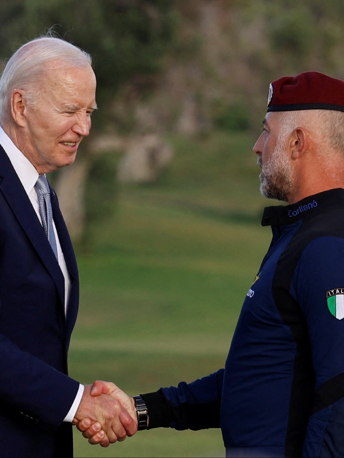 British Prime Minister Rishi Sunak, US President Joe Biden and French President Emmanuel Macron attend a skydiving demonstration, on the first day of the G7 summit, in Savelletri, Italy.