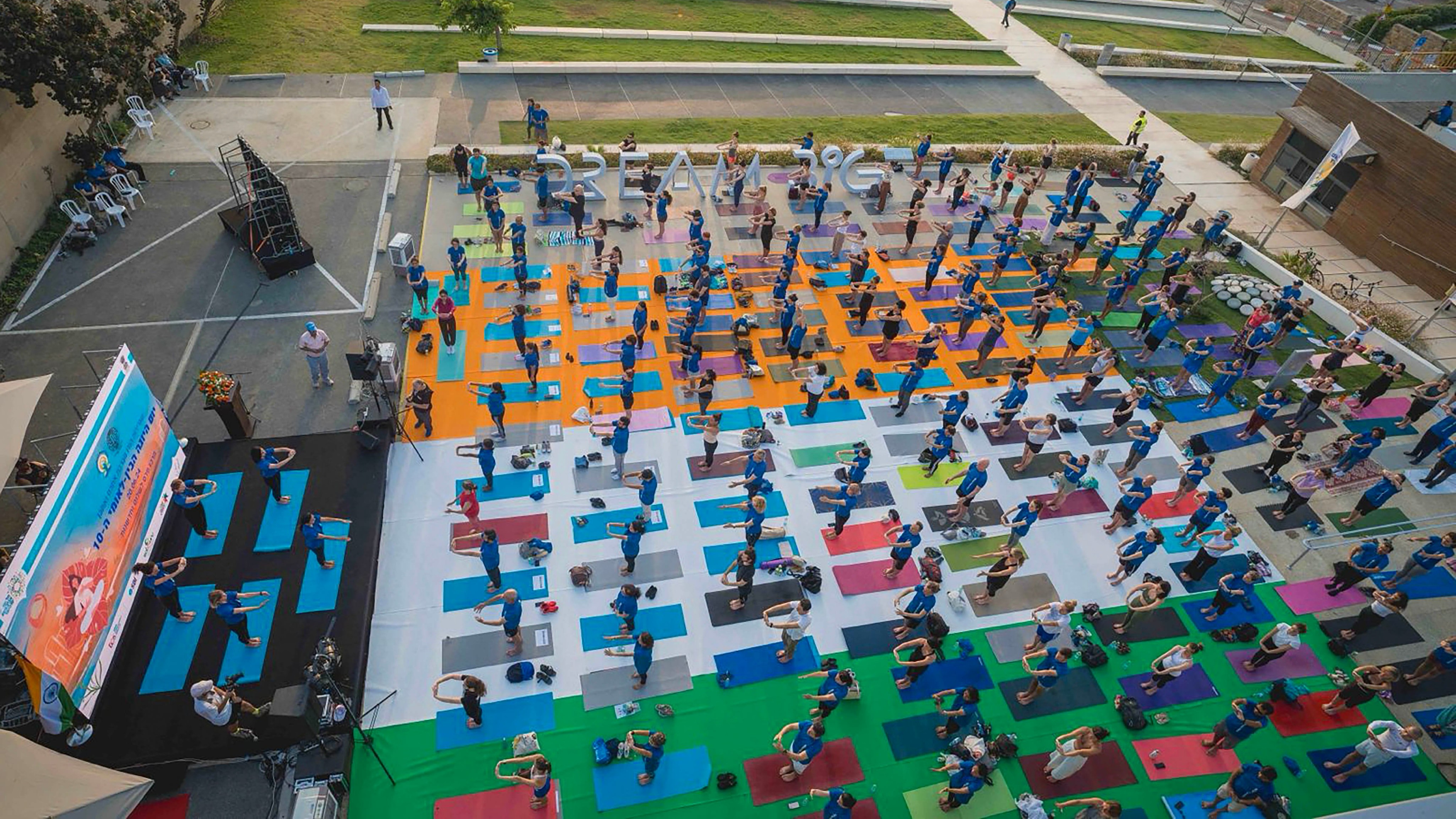 People perform yoga at a programme organised in Tel Aviv, Israel.