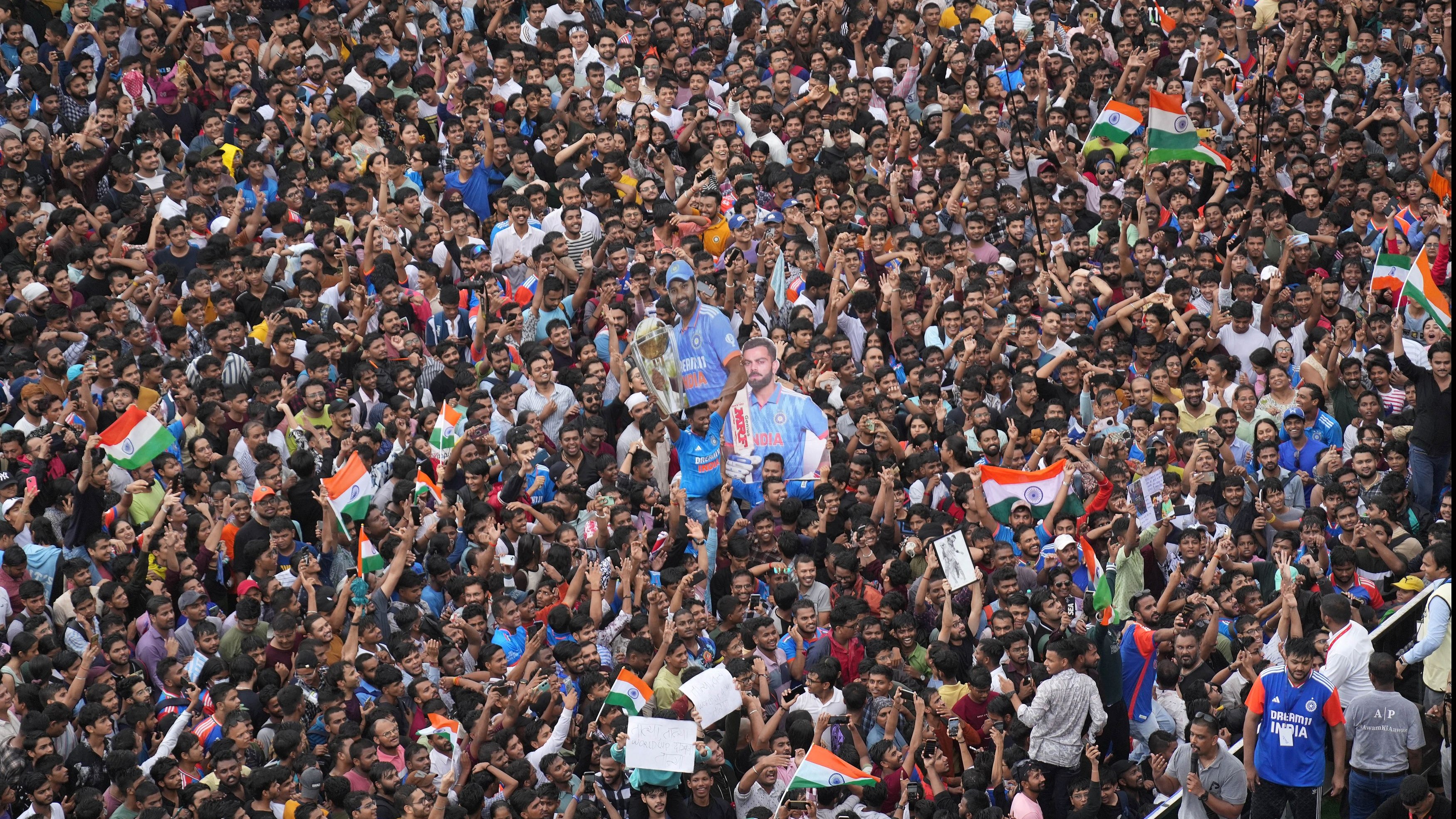 A sea of fans wait for the arrival of Indian cricket team members for a victory parade at Marine Drive in Mumbai.