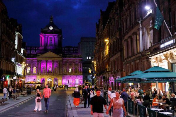 Liverpool Town Hall lights up in pink this evening in tribute to those affected by Southport incident in Liverpool, Britain.