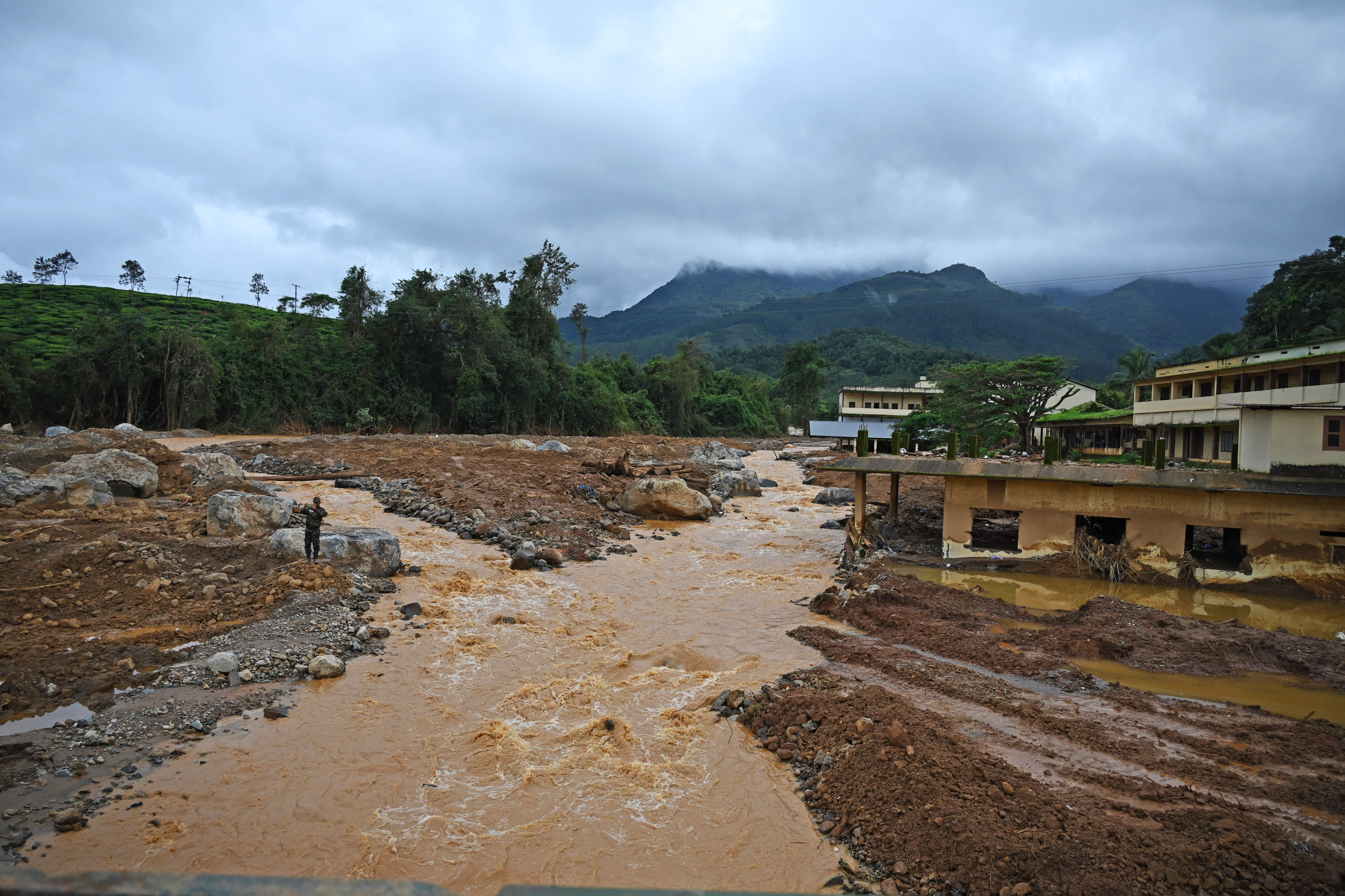 Emergency response personnel and volunteers at Chooralmala where the devastating landslide hit in Wayanad, on Saturday, August 03, 2024.