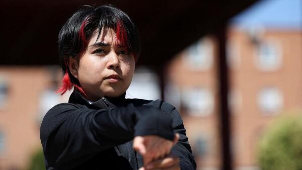 Olympics 2024: Afghan refugee athlete disqualified for slogan on cape