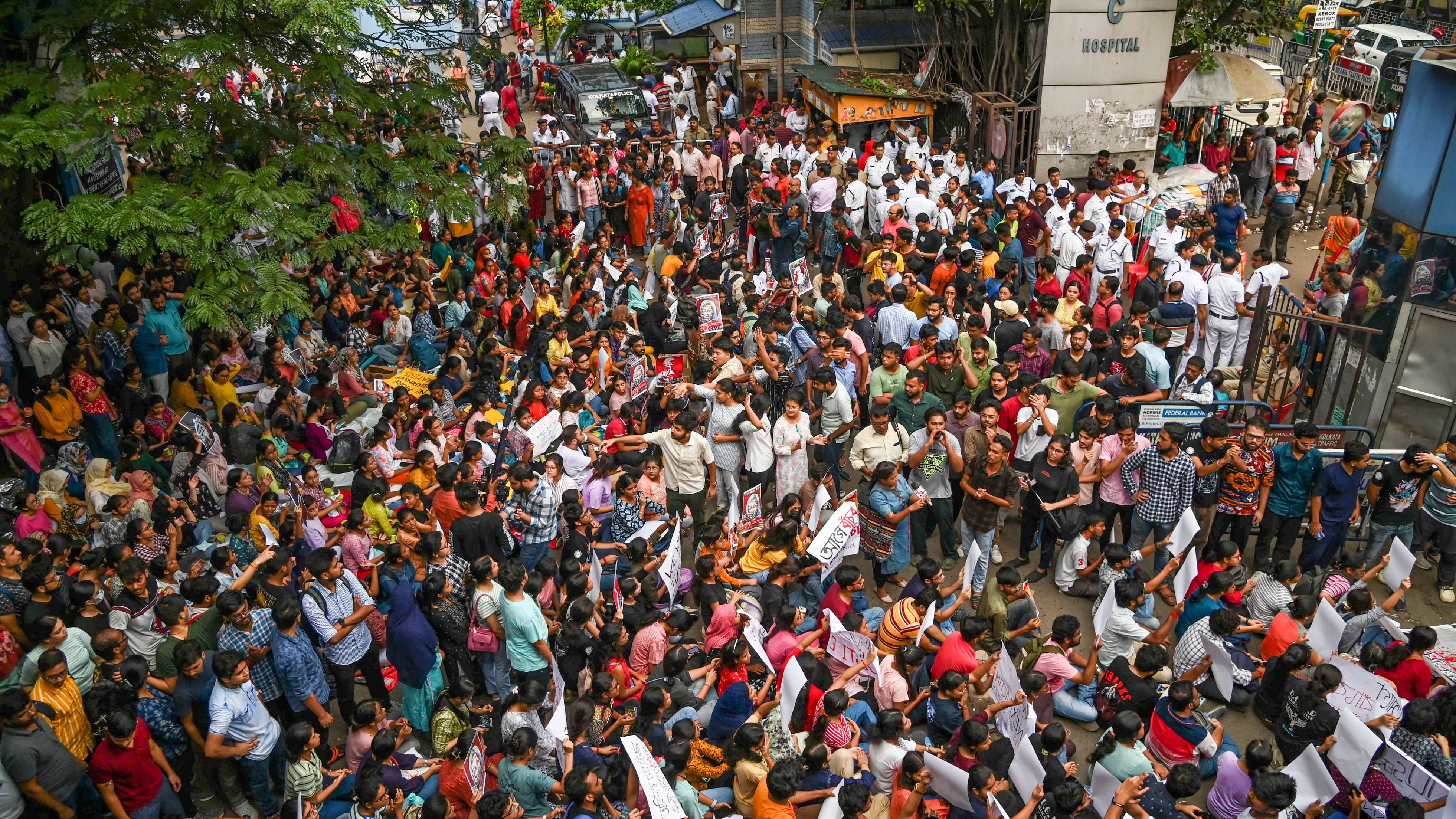 Junior doctors protest against the alleged rape and killing of a trainee doctor, at RG Kar Medical College and Hospital in Kolkata.