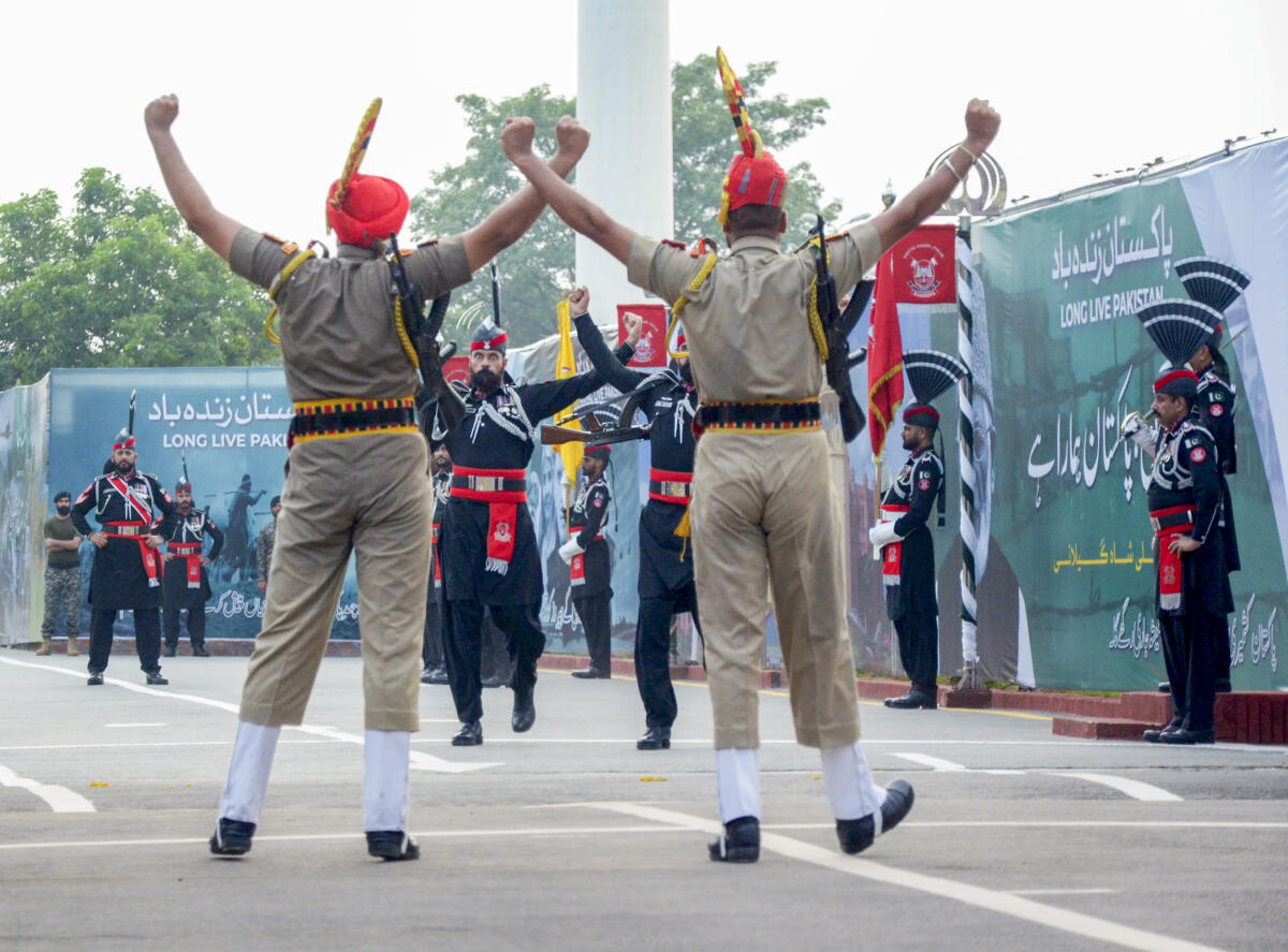 Border Security Force and Pakistan Rangers personnel during the Beating Retreat ceremony at the India-Pakistan Attari-Wagah border post on 78th Independence Day, near Amritsar. 