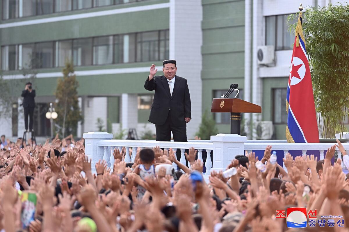 North Korean leader Kim Jong Un visits a shelter for flood victims.