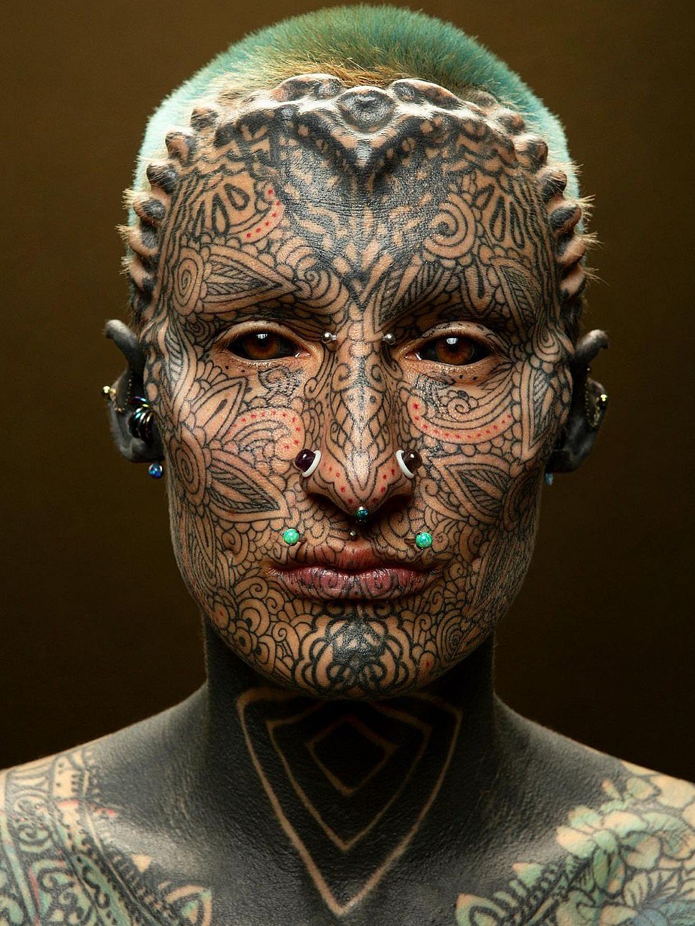 Woman with Tattoos All Over Body Shatters Records