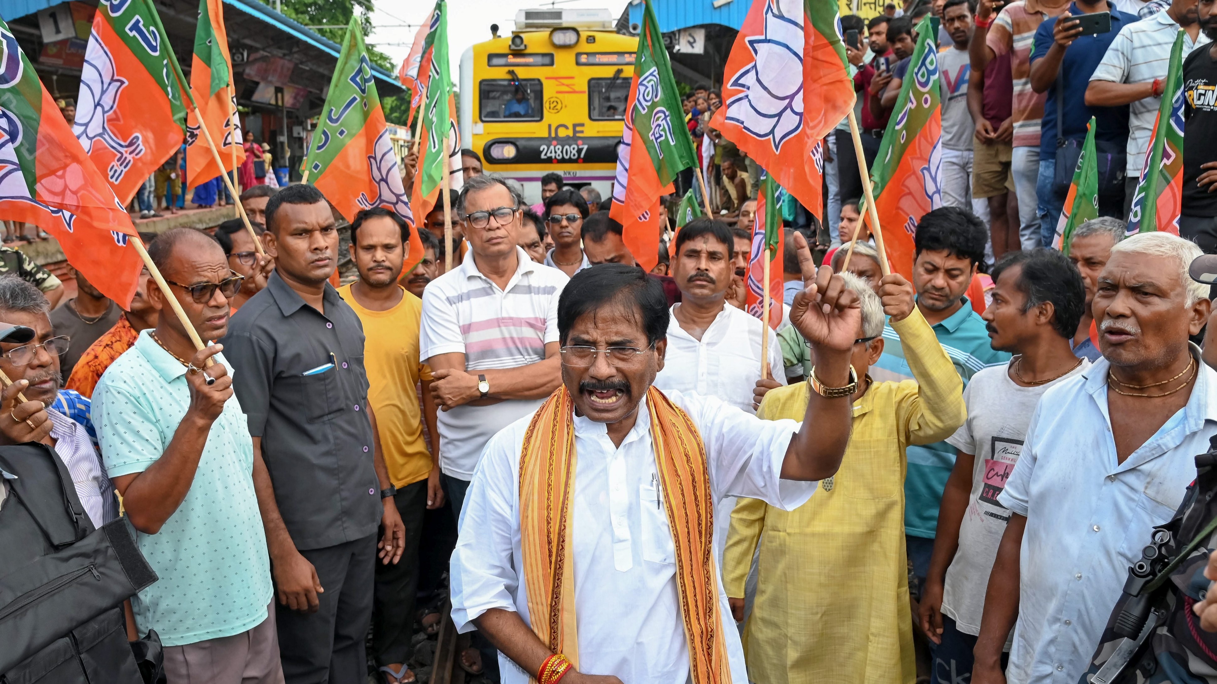BJP MP Jagannath Sarkar along with party workers block railway tracks at Shantipur station during the party's 12-hour general strike in Bengal (Bengal Bandh) to protest the police action against participants of Tuesday's ‘Nabanna Abhijan’ rally which was held against the Kolkata RG Kar incident, in Nadia, West Bengal.