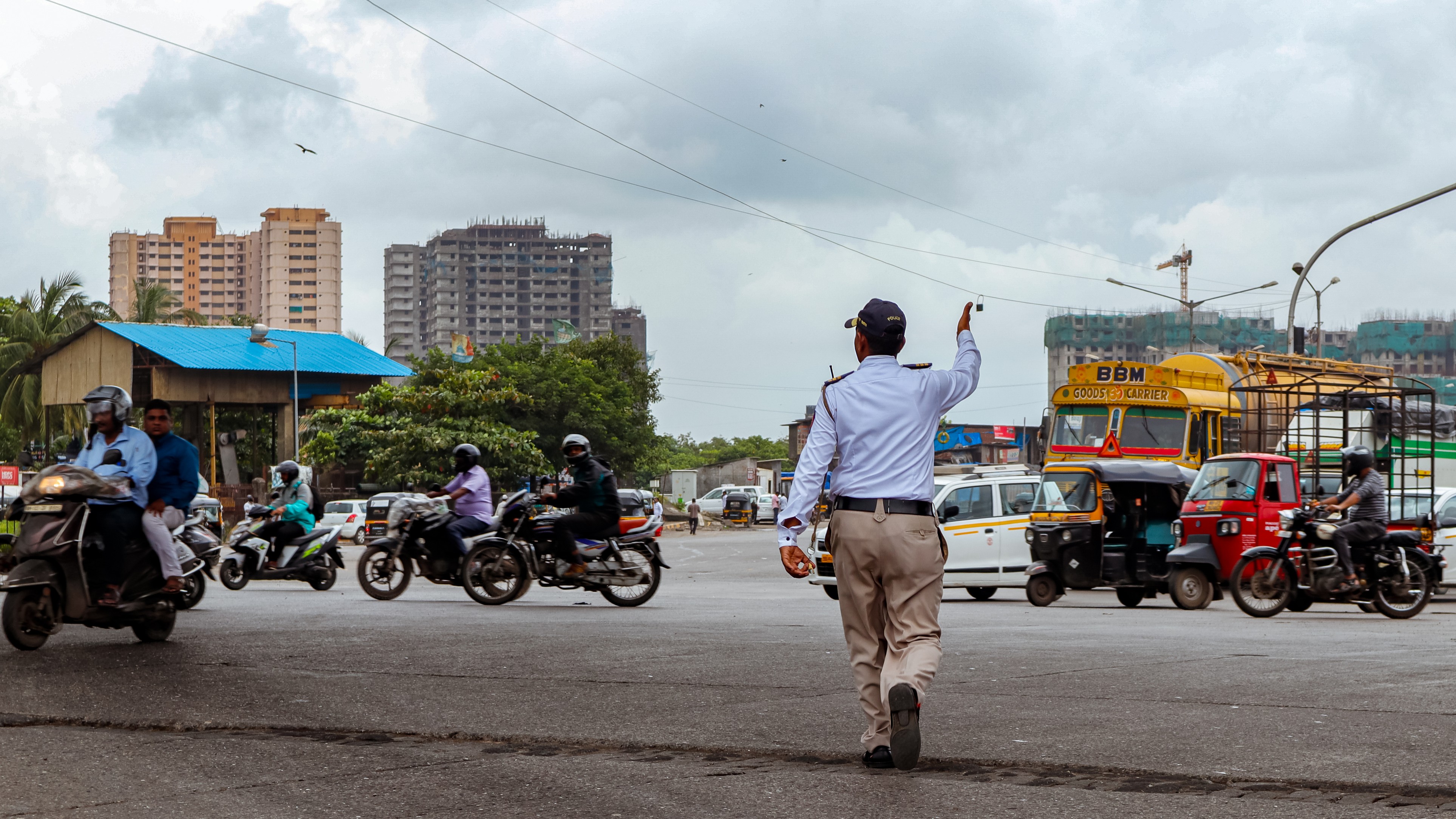 Woman sits on bike’s fuel tank, hugs rider while driving in Delhi; police slams Rs 11,000 fine