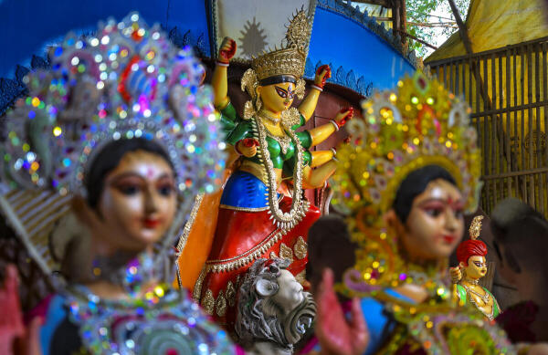 An idol of Goddess Durga at a workshop before it is taken to a pandal amid Durga Puja festivities, in Jaipur.