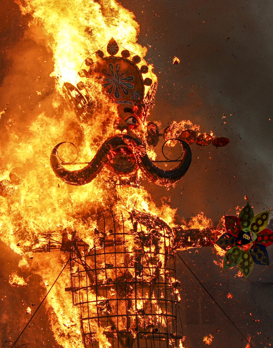 An effigy of demon king ‘Ravana’ burns during celebration of the ‘Dussehra’ (Vijayadashami) festival, in Jammu.