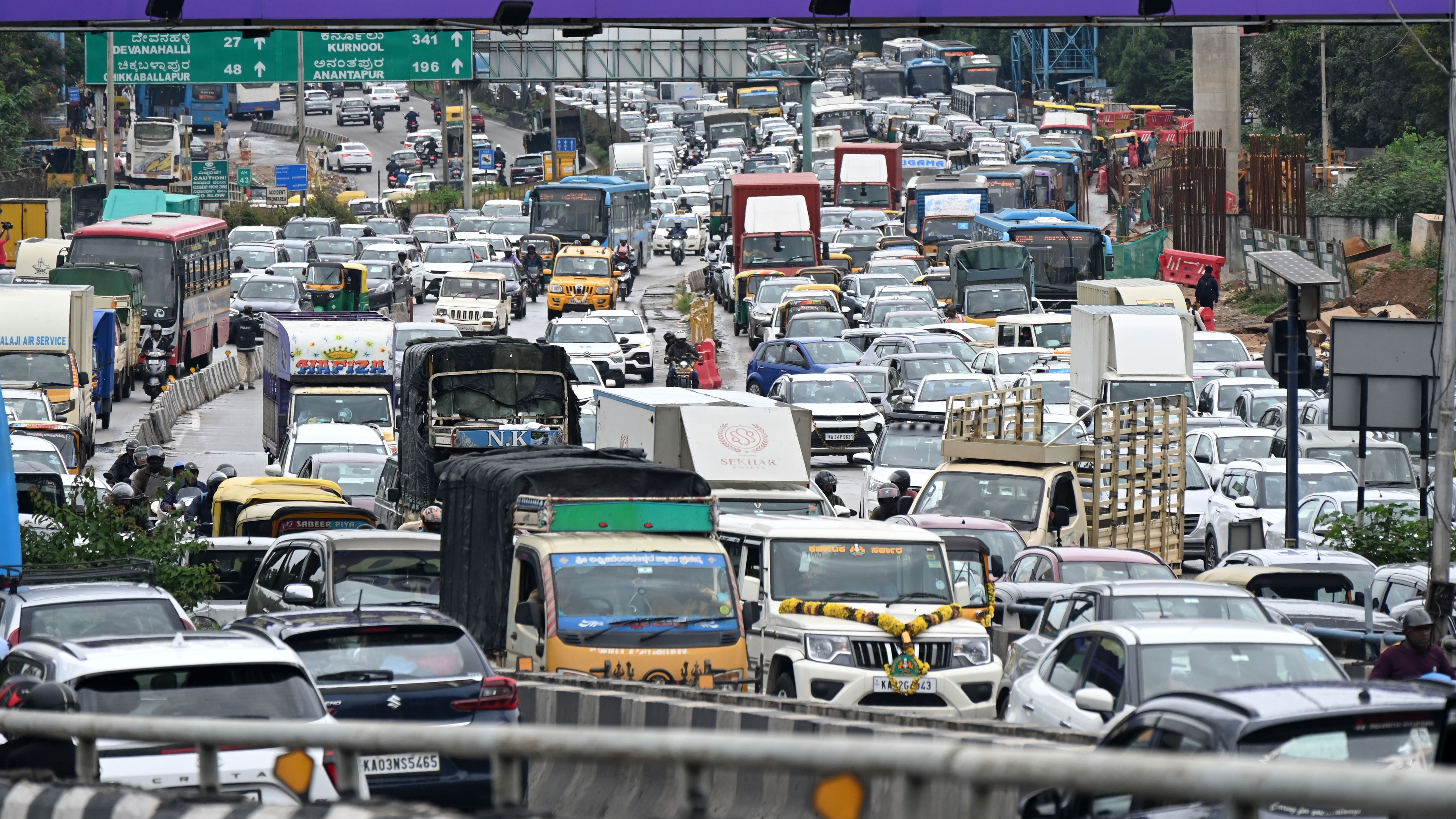 A jammed Airport Road near Hebbal flyover on Monday. 
