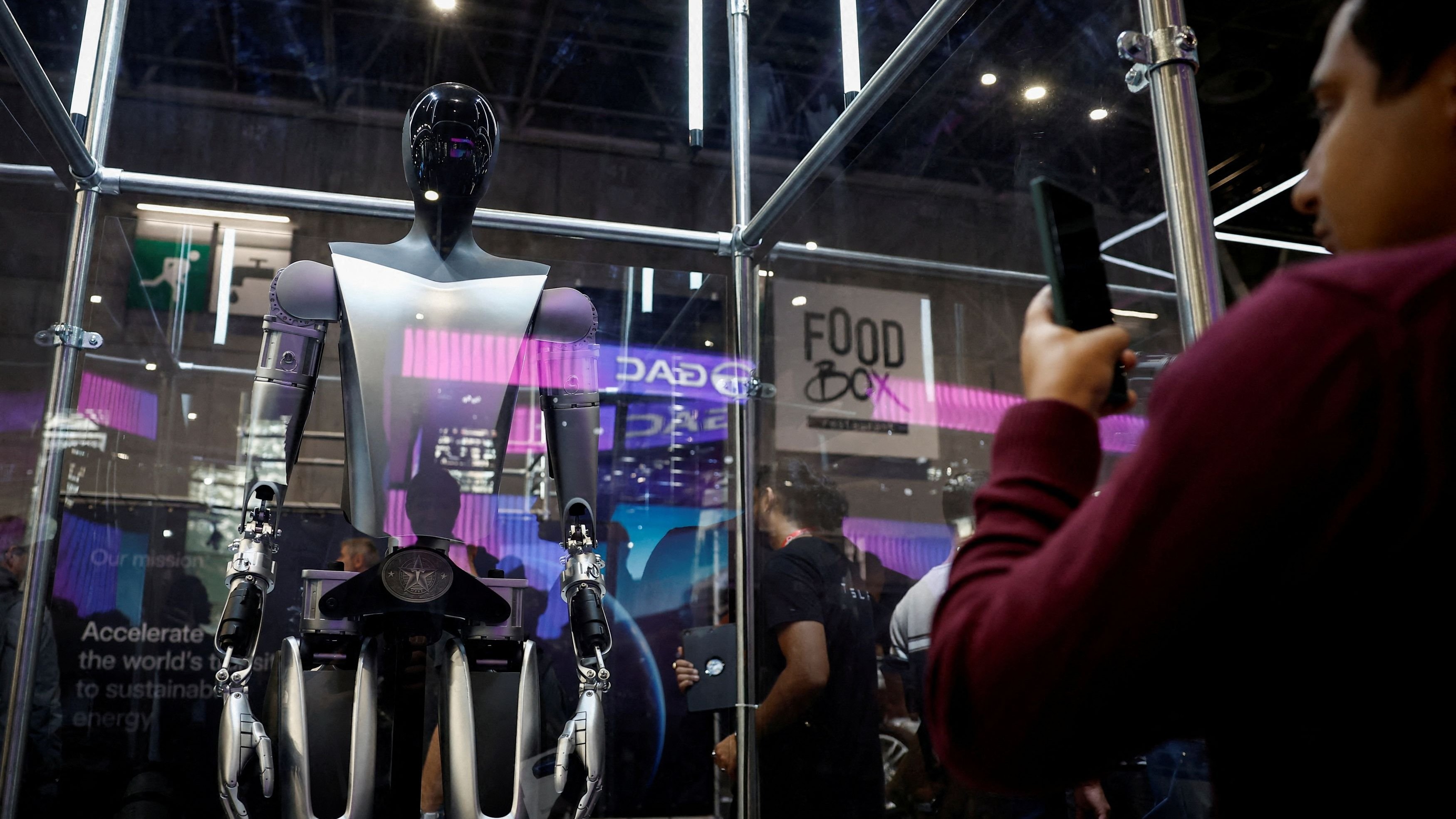Musk’s humanoid robots are coming — but they won’t mow your lawn