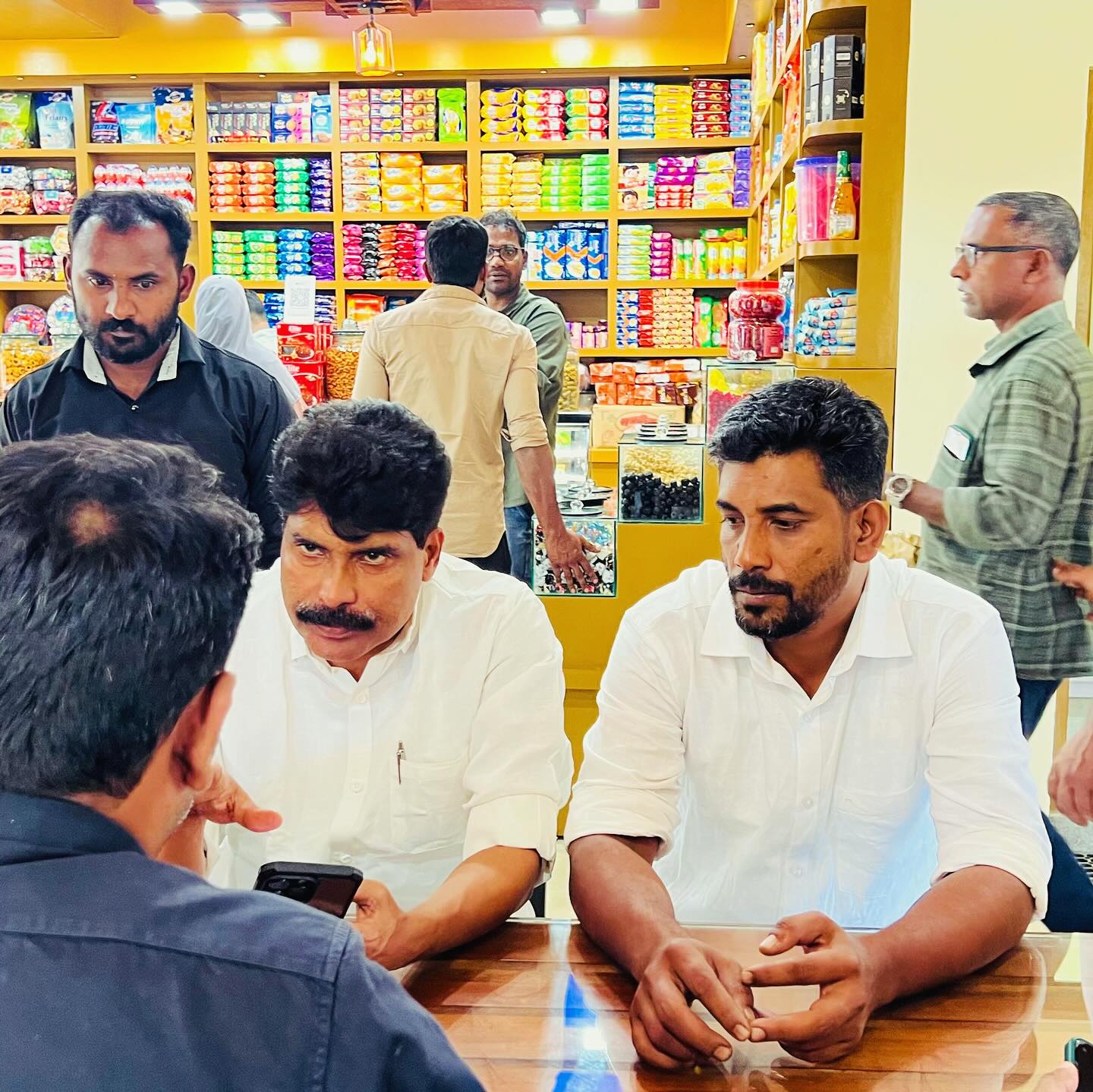 Congress MLA T Siddique with Noufal at his newly opened shop named 'July 30'