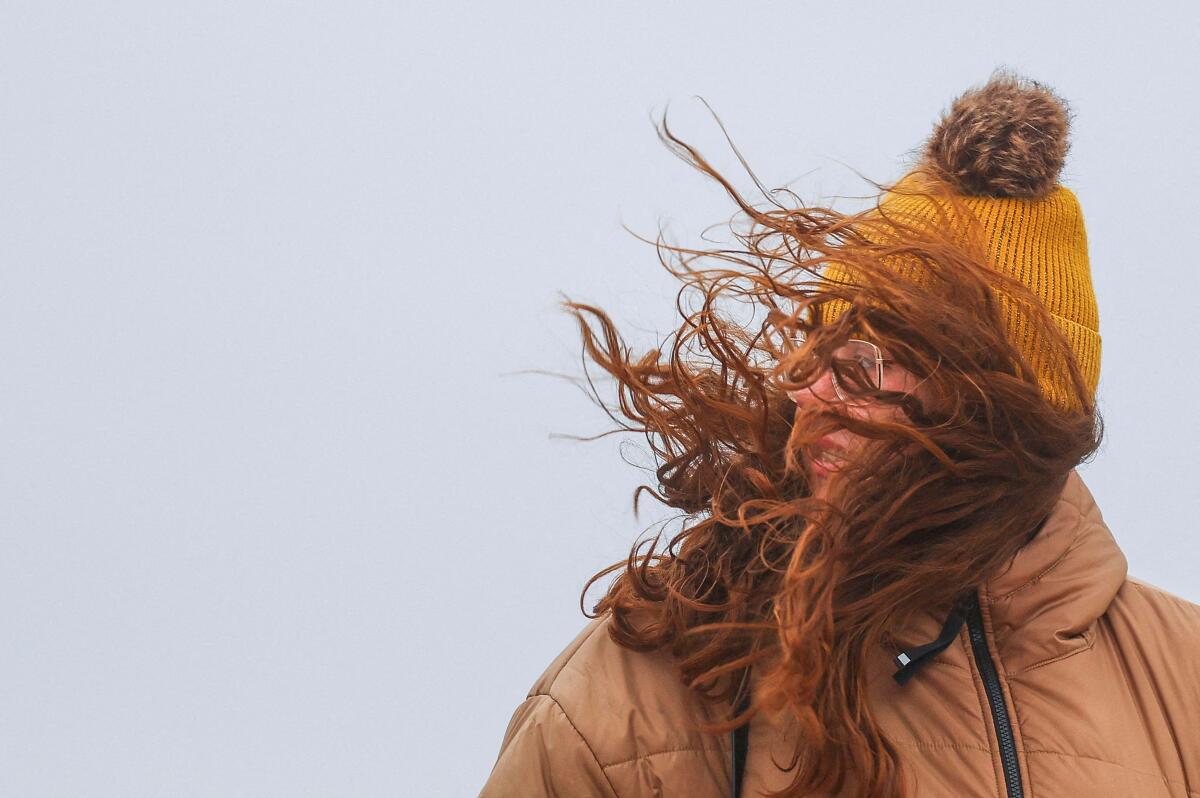 A person looks on after Storm Darragh hit the country in Blackpool, Britain.