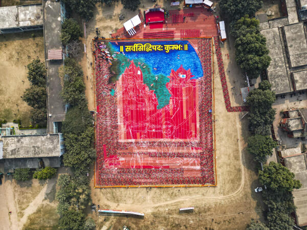 Shikha with her team attempts to create world's largest 'rangoli' at an event in Prayagra