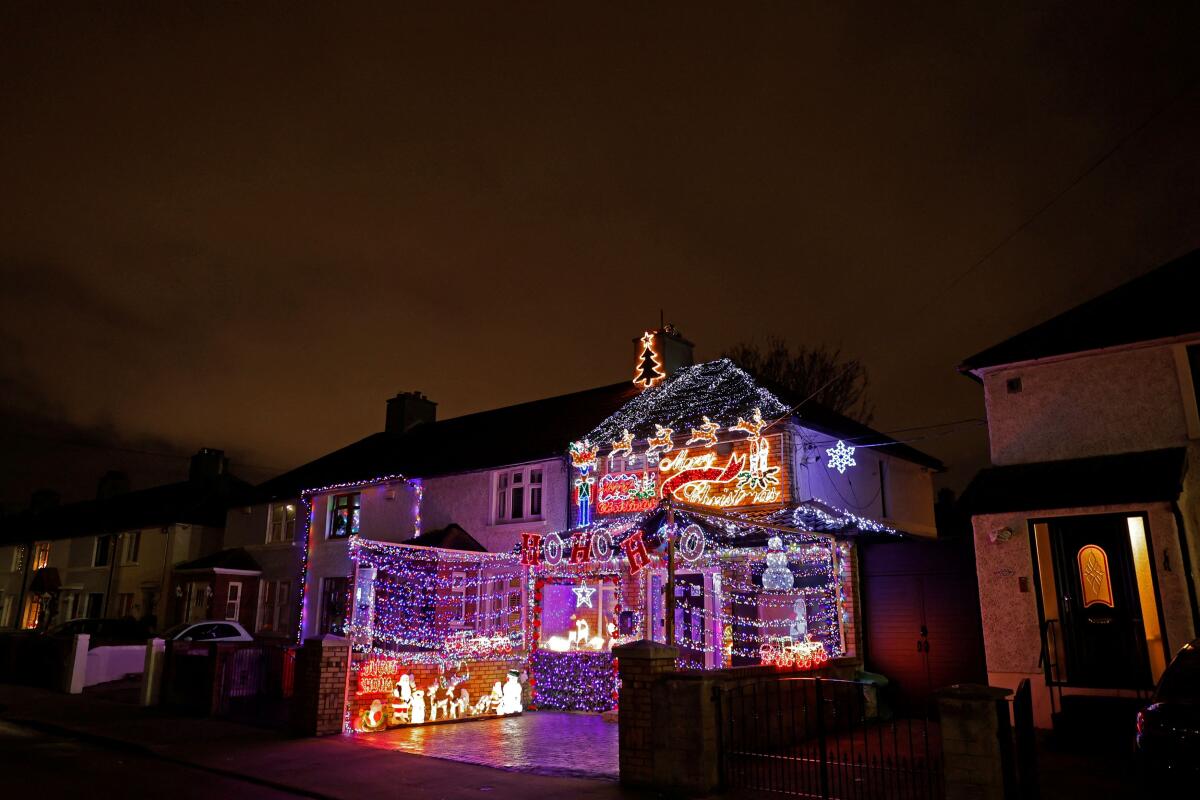A residential house is illuminated with Christmas lights in Dublin, Ireland