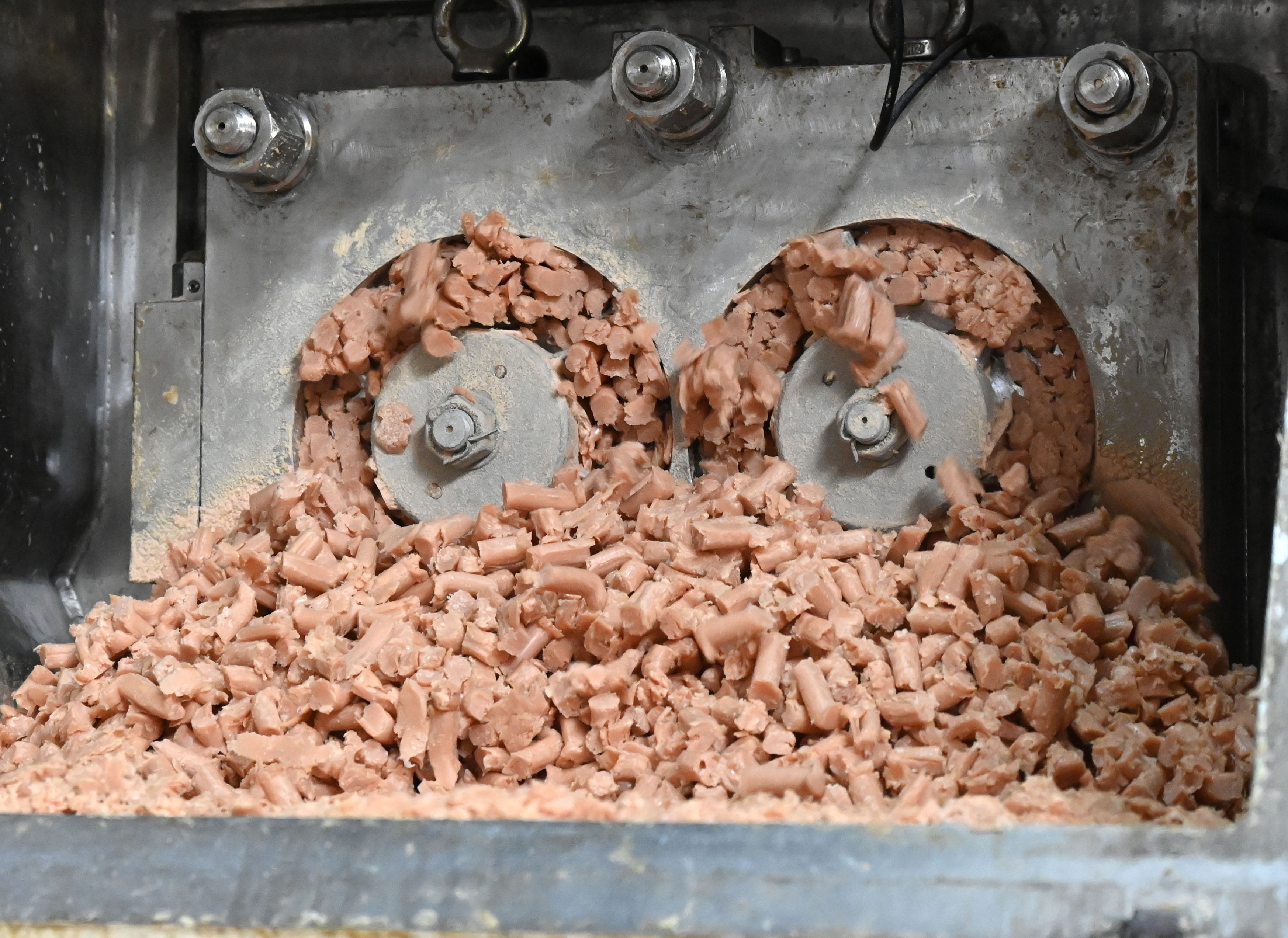 Soap noodles are mixed with glycerin, colourants, sandalwood oil and perfumes.