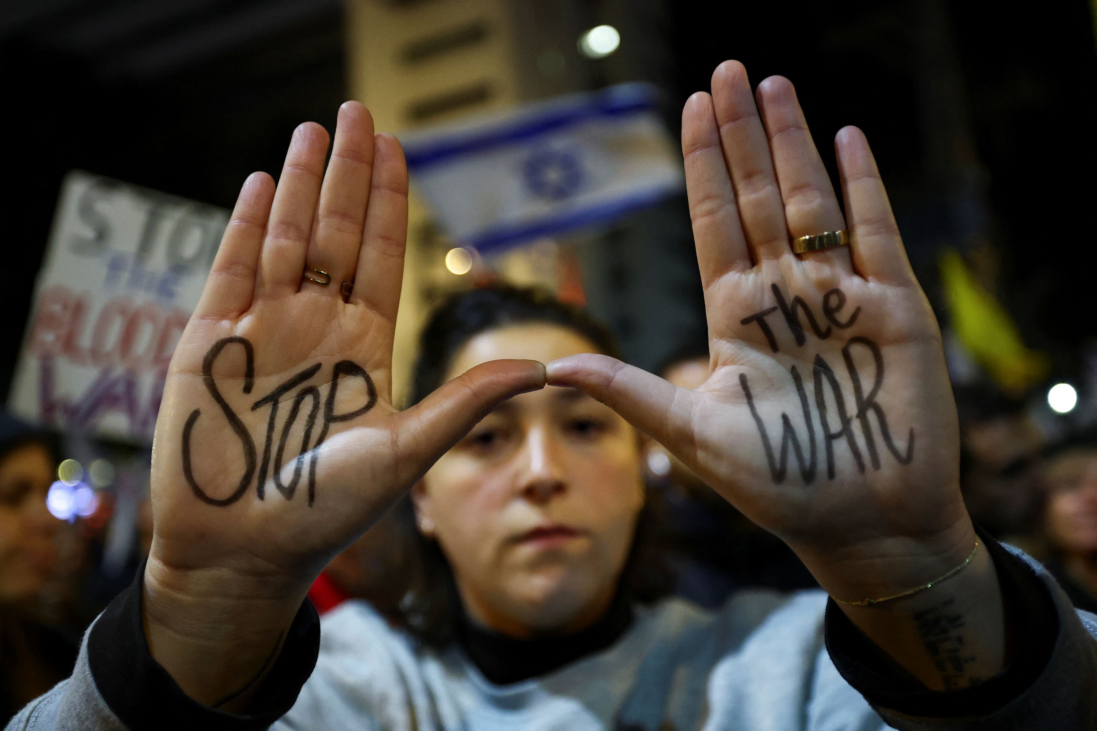 An anti-war protestor during a demonstration against Israel's war with Hamas.