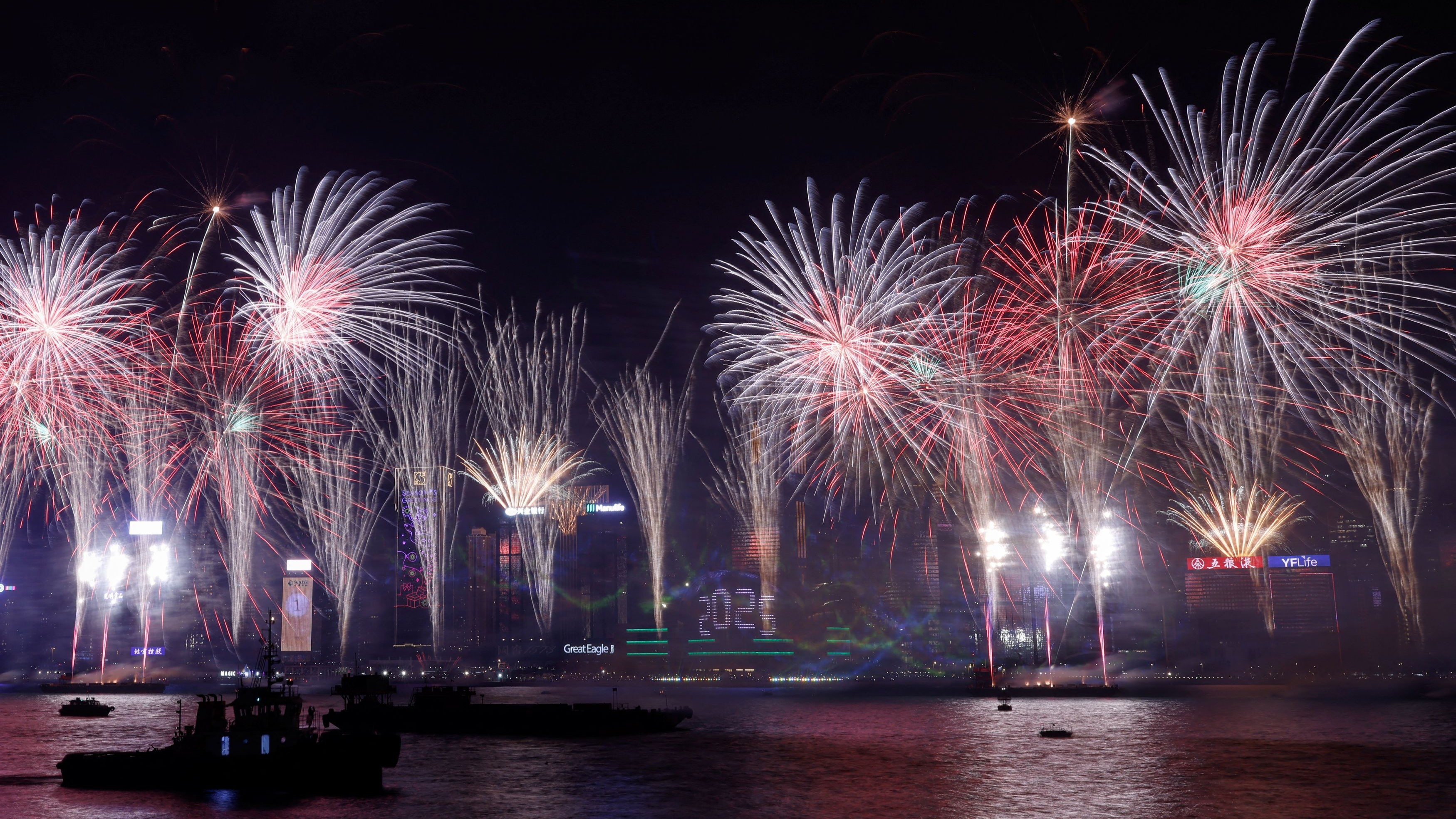 Fireworks explode over Victoria Harbour to celebrate the New Year in Hong Kong.