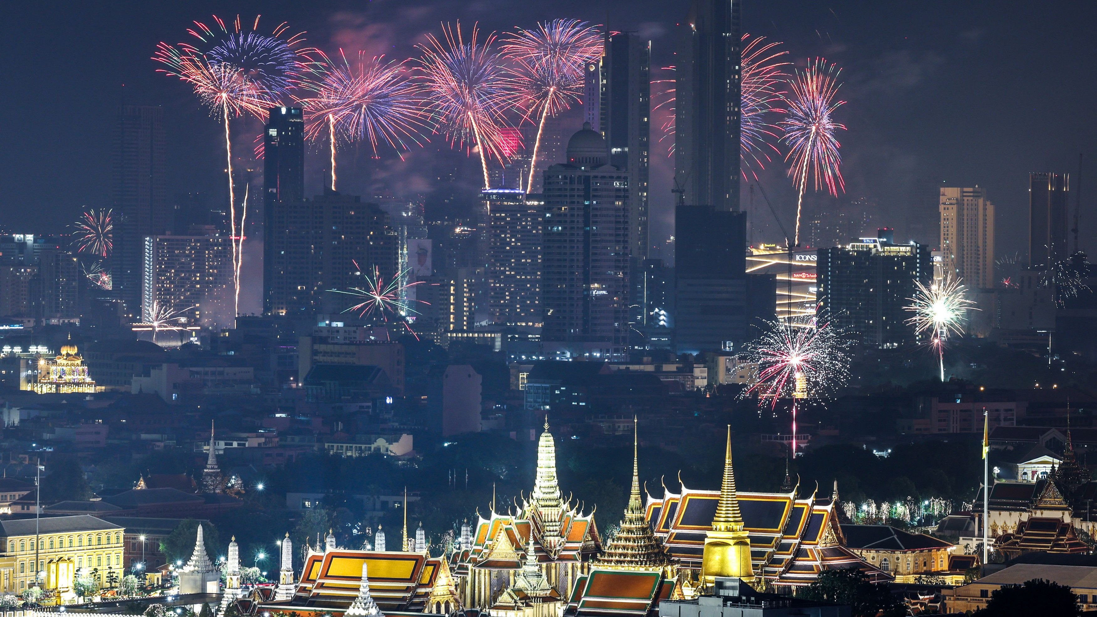 Fireworks explode over the Grand Palace during the New Year celebrations in Bangkok, Thailand.