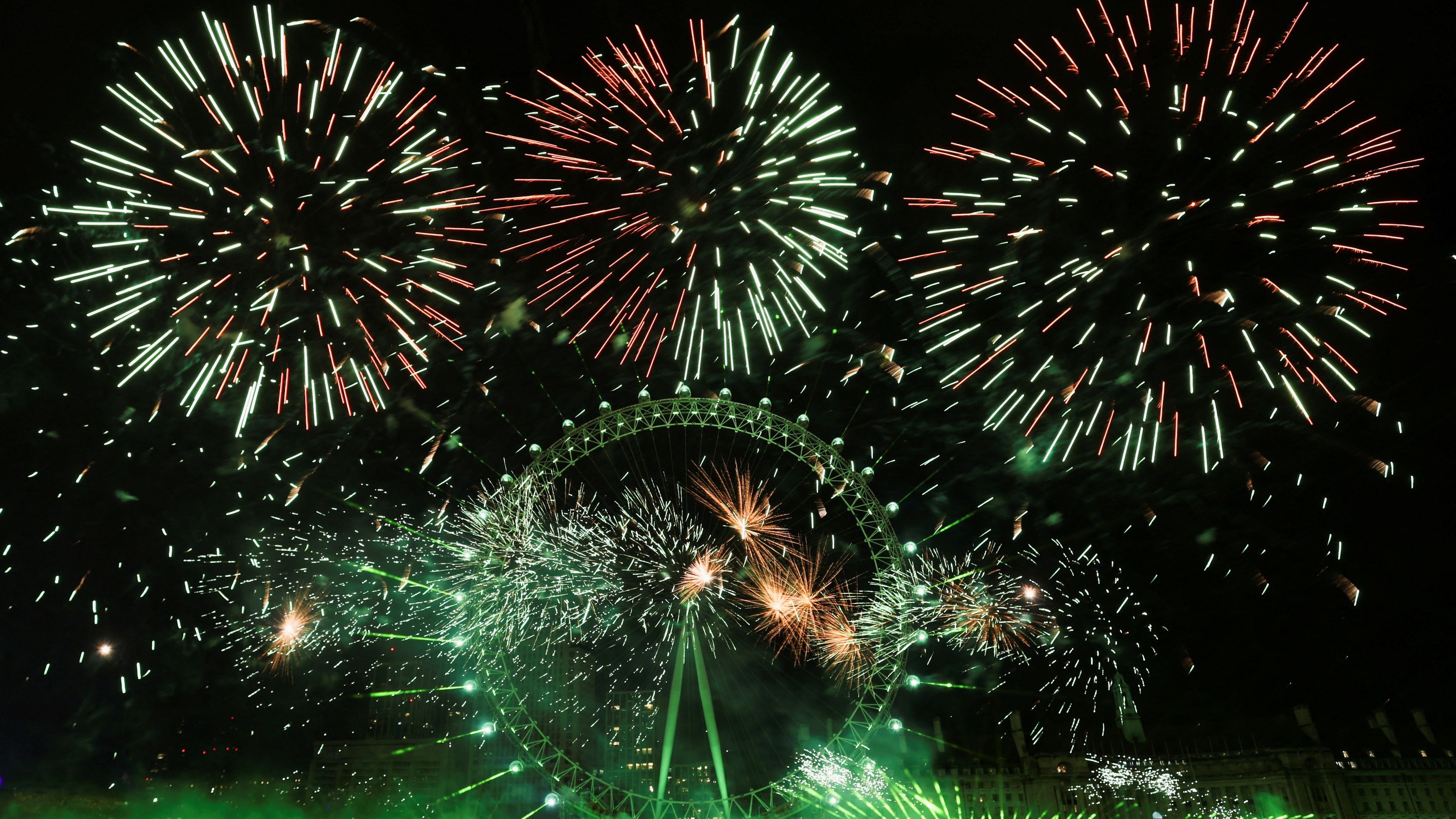 Fireworks explode over the London Eye Ferris wheel as Britons across the country welcome the New Year in London, Britain.