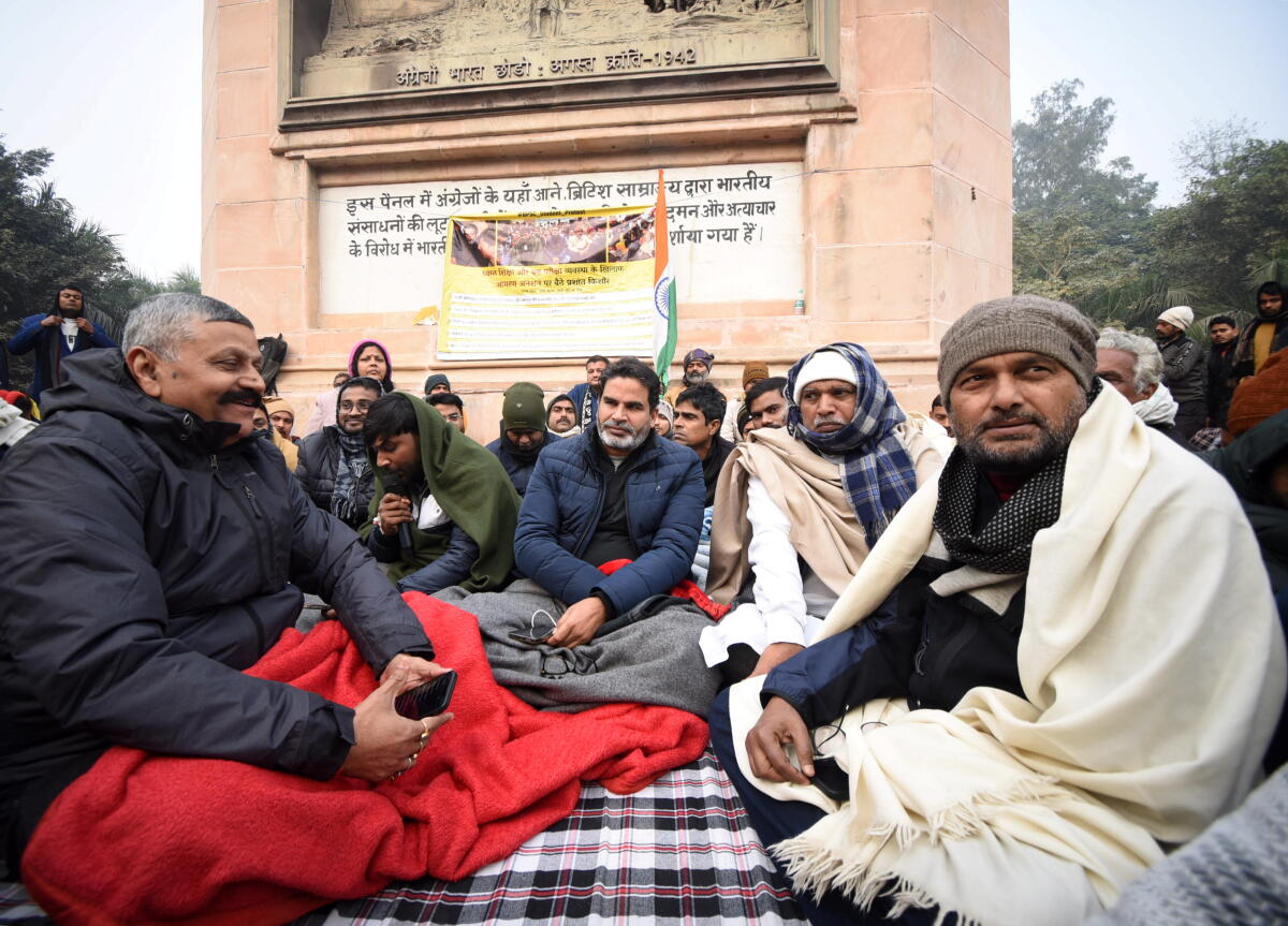 Jan Suraaj chief Prashant Kishor (c) with others during his indefinite hunger strike demanding the cancellation of the 70th Integrated Combined Competitive (Preliminary) Examination (CCE), 2024, conducted by the BPSC, over allegations of question paper leak, in Patna, Friday, January 3, 2025.