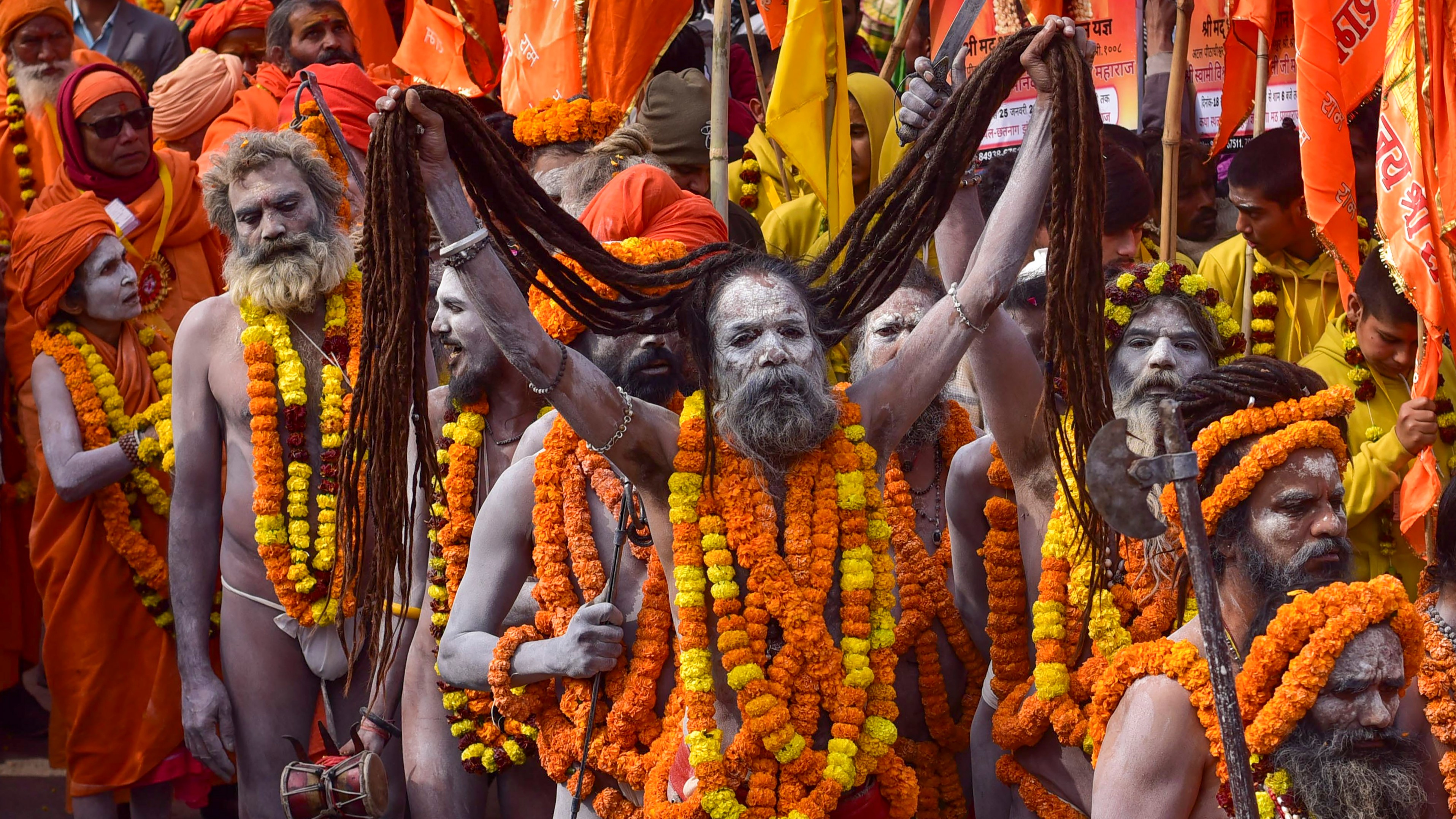 Naga sadhus of Sri Panchayati Atal Akhada take part in the 'Chavni Pravesh', or royal entry procession, ahead of Mahakumbh at the Sangam in Prayagraj.