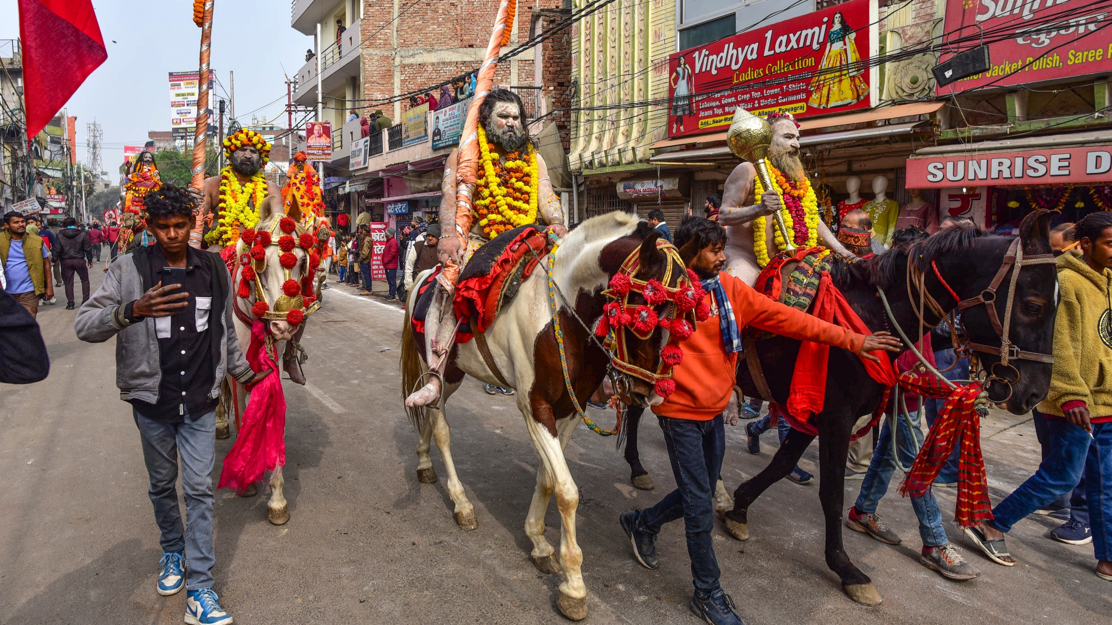 Naga Sadhus of ‘Shri Niranjani Akhara’ take part in a procession towards Sangam ahead of Maha Kumbh Mela 2025 in Prayagraj.