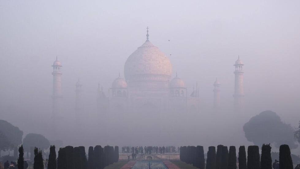 he Taj Mahal is seen enveloped in fog on a winter morning, in Agra, Wednesday, Jan. 8, 2025.