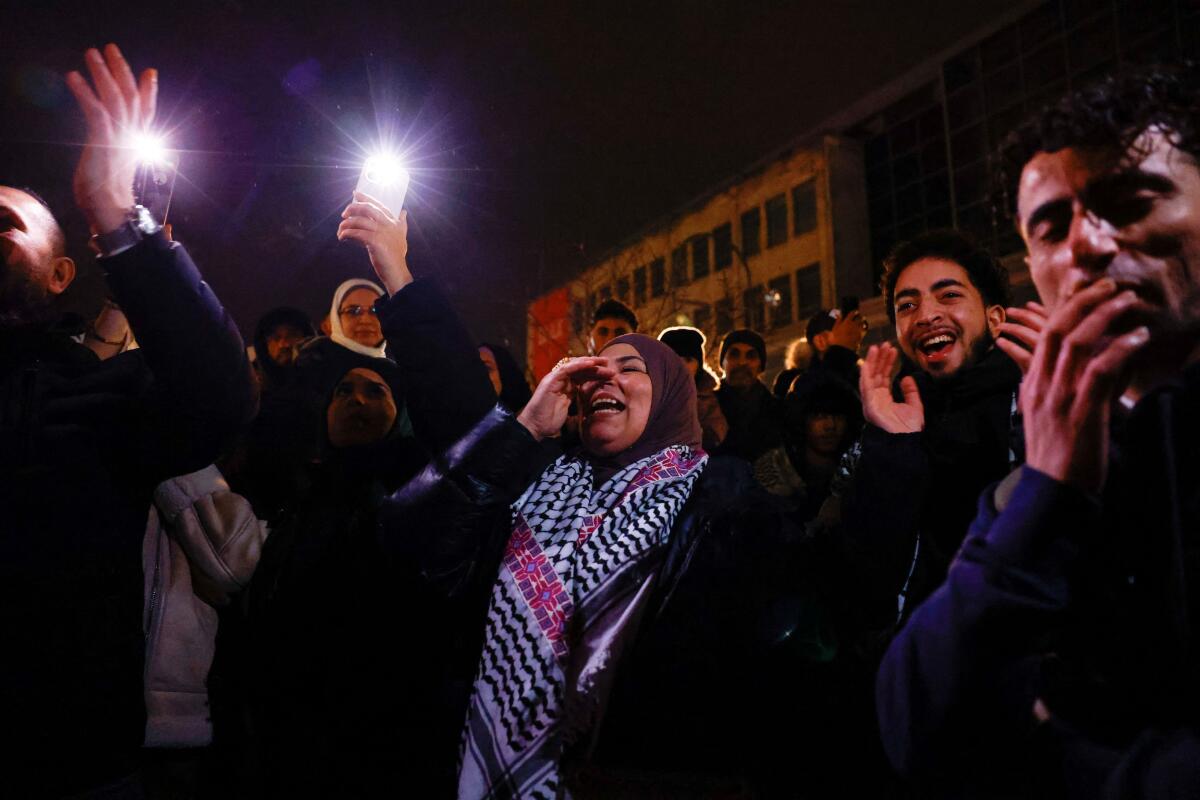 Palestinian supporters celebrate news of a ceasefire with Israel, in Berlin, Germany.