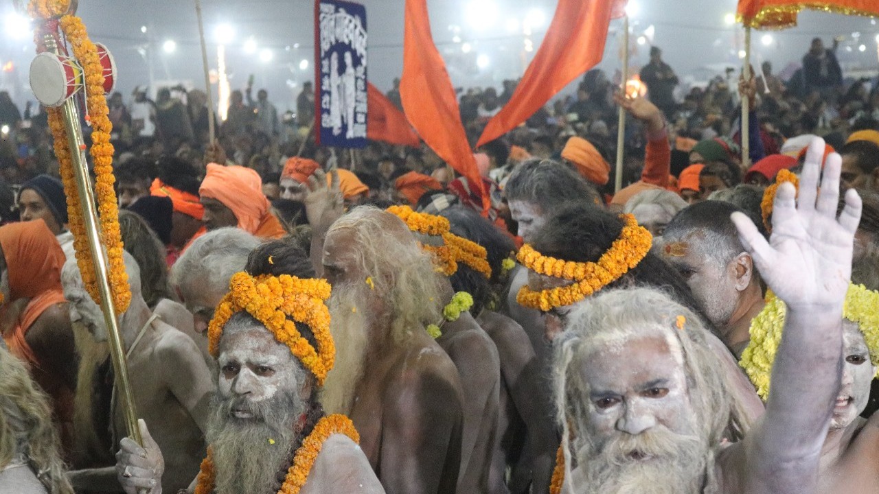 Naga babas moving towards the sangam to take a holy dip on the auspicious day of Makar Sankranti at the MahaKumbh 2025 at Prayagraj, Uttar Pradesh.
