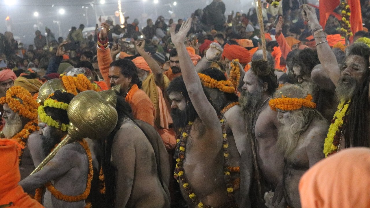 Naga babas moving towards the sangam to take a holy dip on the auspicious day of Makar Sankranti at the MahaKumbh 2025 at Prayagraj, Uttar Pradesh.
