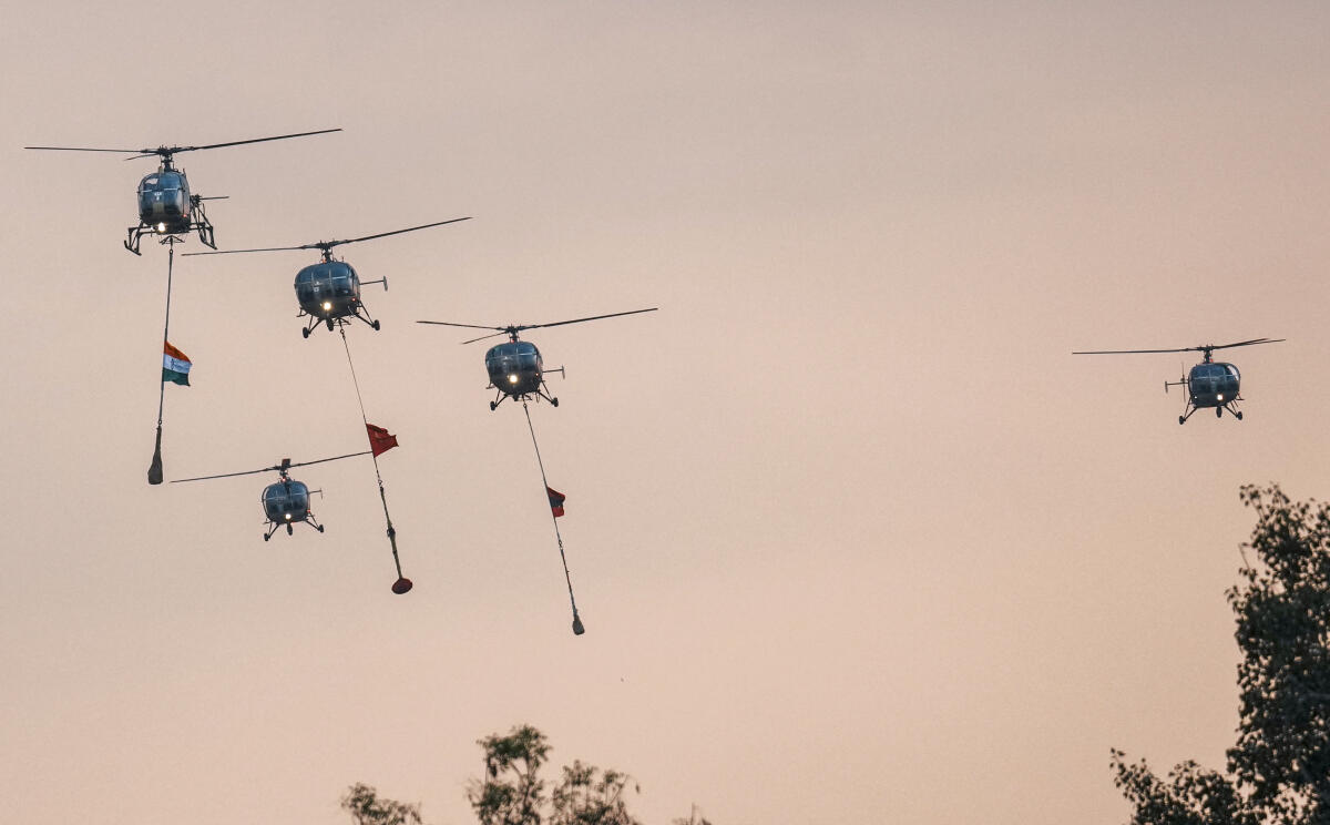 Indian army's aerial display of the national flag and military colours during ‘Gaurav Gaatha’ event as part of the 77th Army Day celebrations, at the Bombay Engineers Group (BEG) and Centre, in Pune.