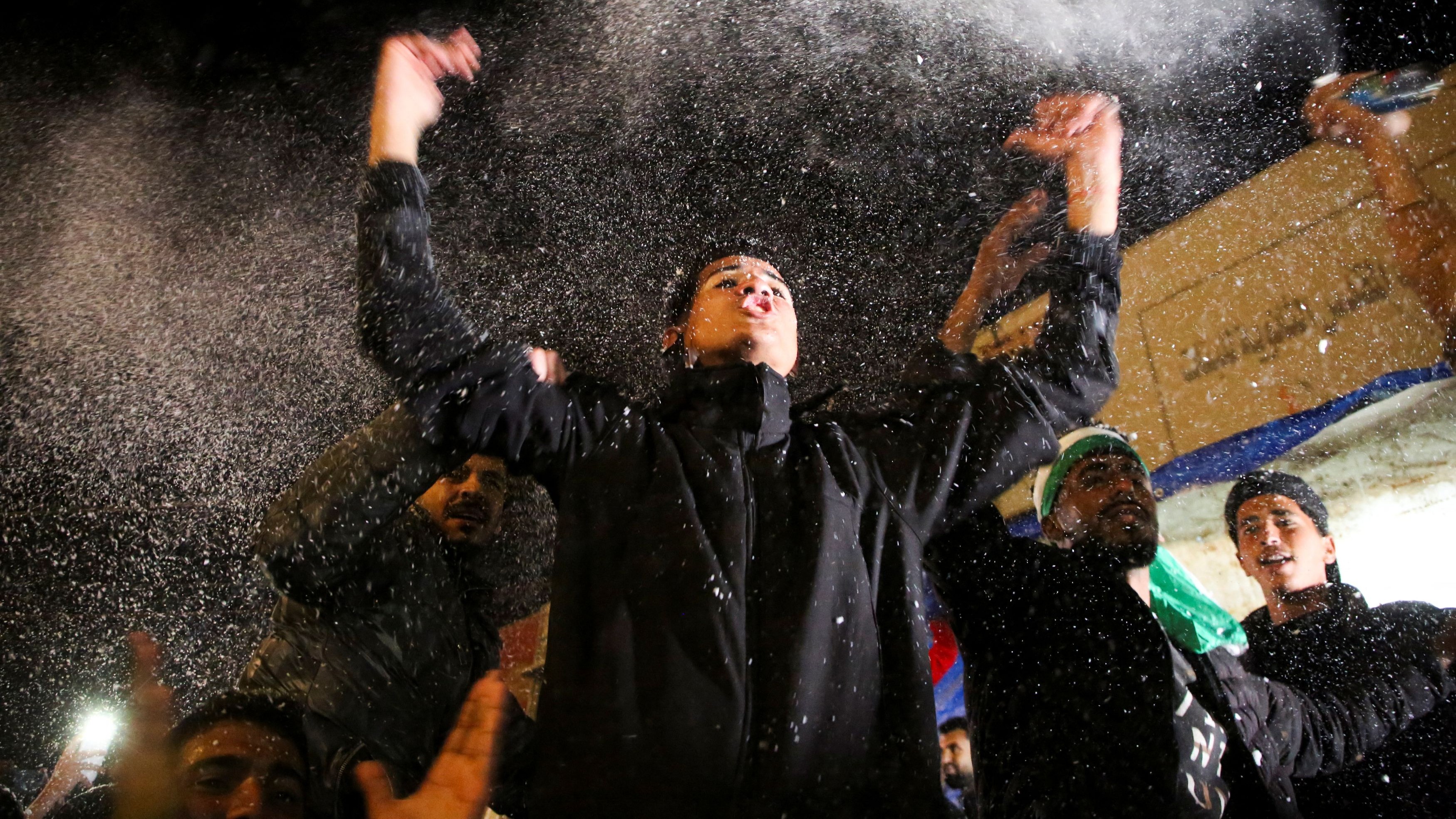 Even as Israel highlighted unresolved points in the agreement, Gazans took to the streets, cheering and embracing one another.