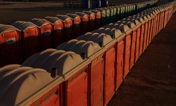 A drone view shows portable toilets close to where Mexican authorities are building a temporary shelter for migrants deported from the United States, in Ciudad Juarez, Mexico.