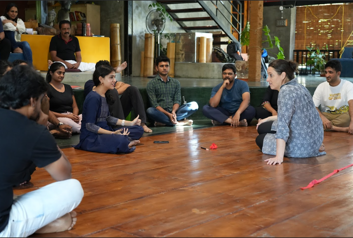 Actor Prakash Rai (in black) looks in on a workshop at Nirdigantha