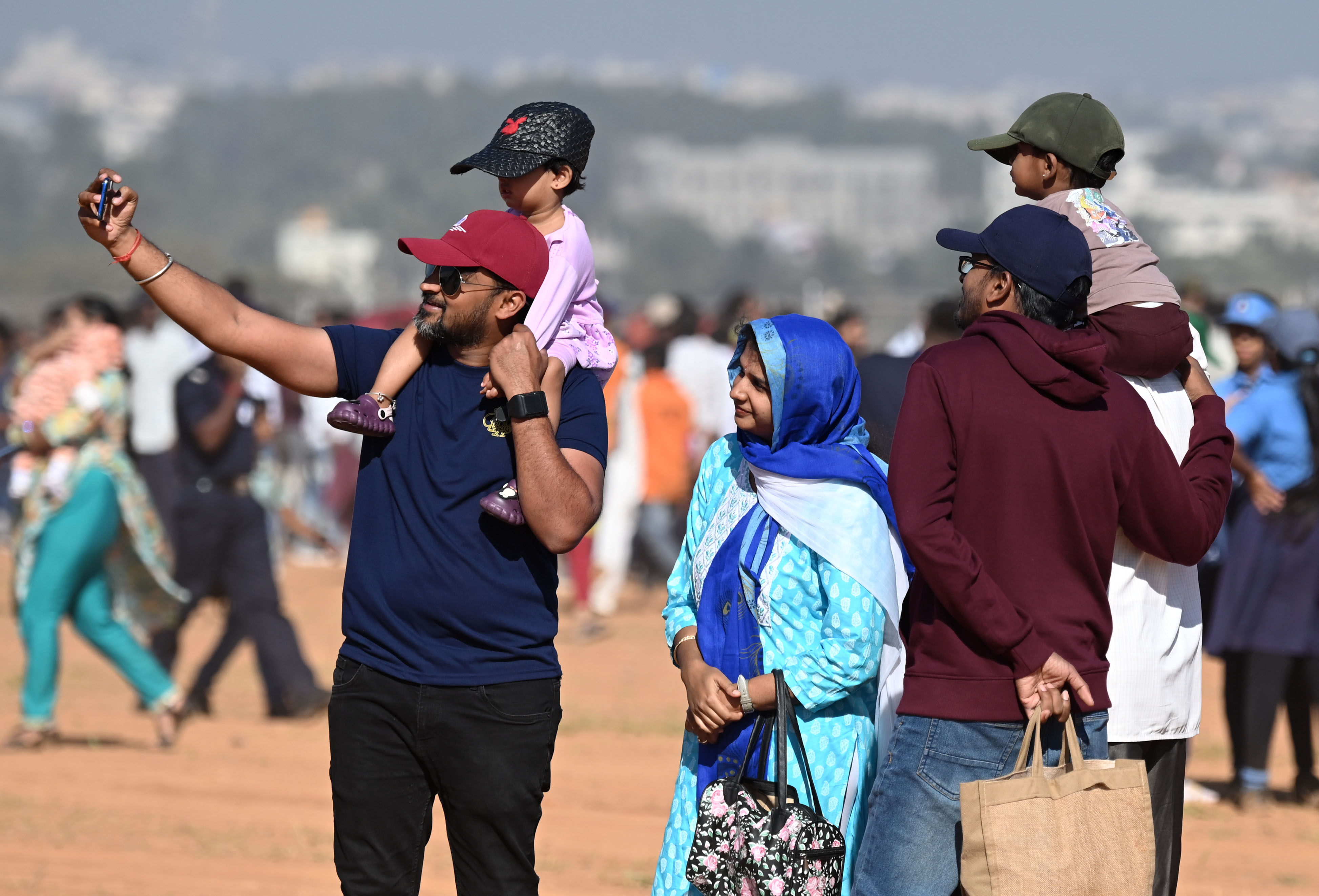 People take selfies during the dress rehearsal. DH Photo/BK Janardhan