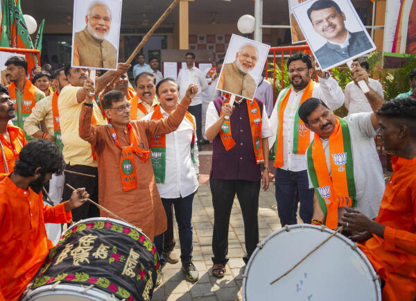 BJP leaders and workers celebrate their victory in Delhi Assembly elections in Mumbai.
