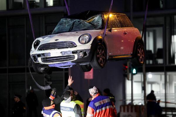The car used in what the Bavarian Premier Markus Soeder said was probably an attack, is being removed from a street, in Munich, Germany, February 13, 2025. 
