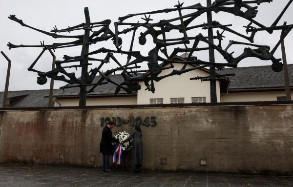 U.S Vice President JD Vance and second lady Usha Vance lay a memorial wreath during their visit at Dachau Concentration Camp Memorial Site in Dachau, Germany February 13, 2025.